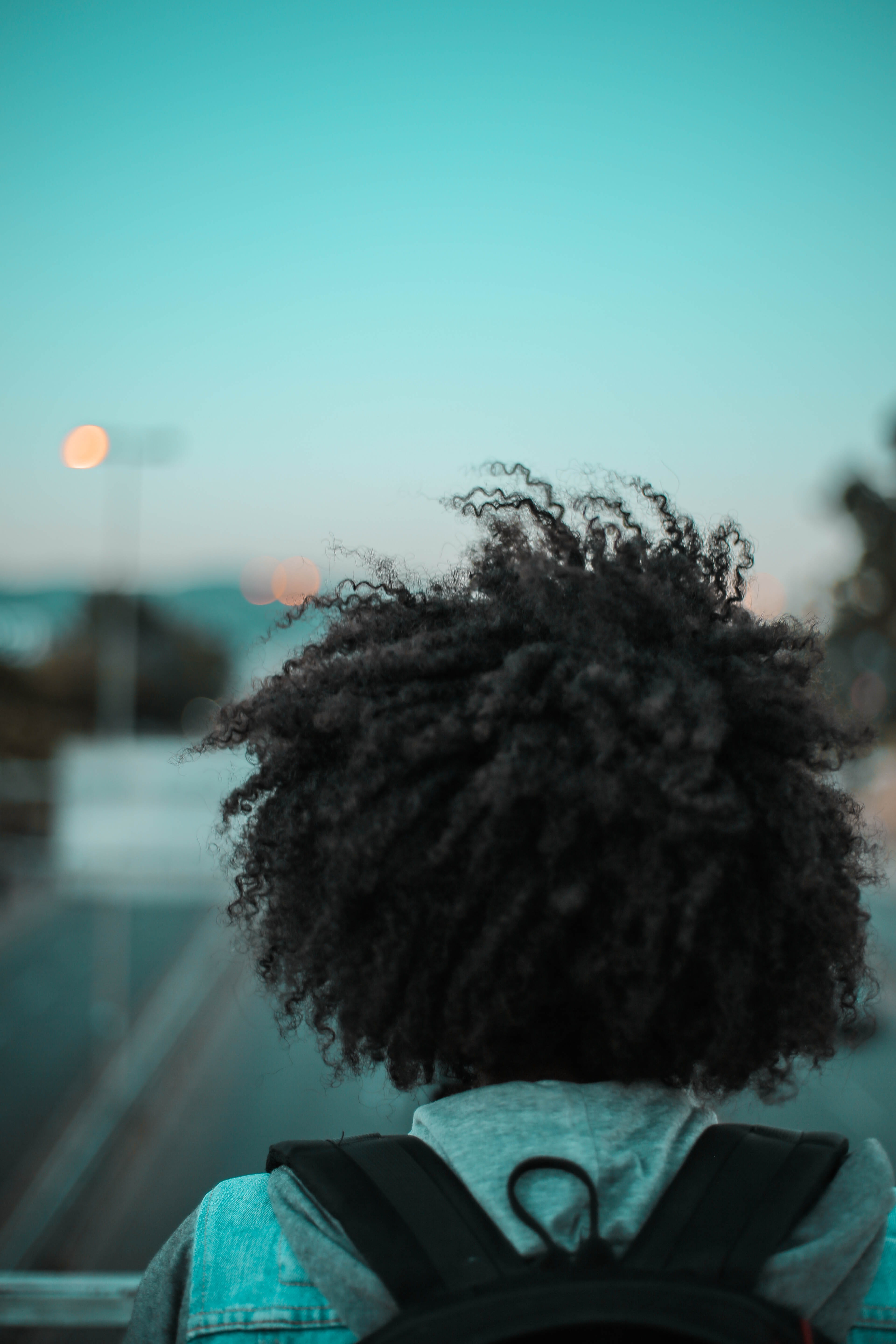 day, hairstyle, outdoors, smoke, nature, banister, sky, pollution, office building, warm clothing, one person, plant, human hair, machine, person, hair, Phone HD Wallpaper