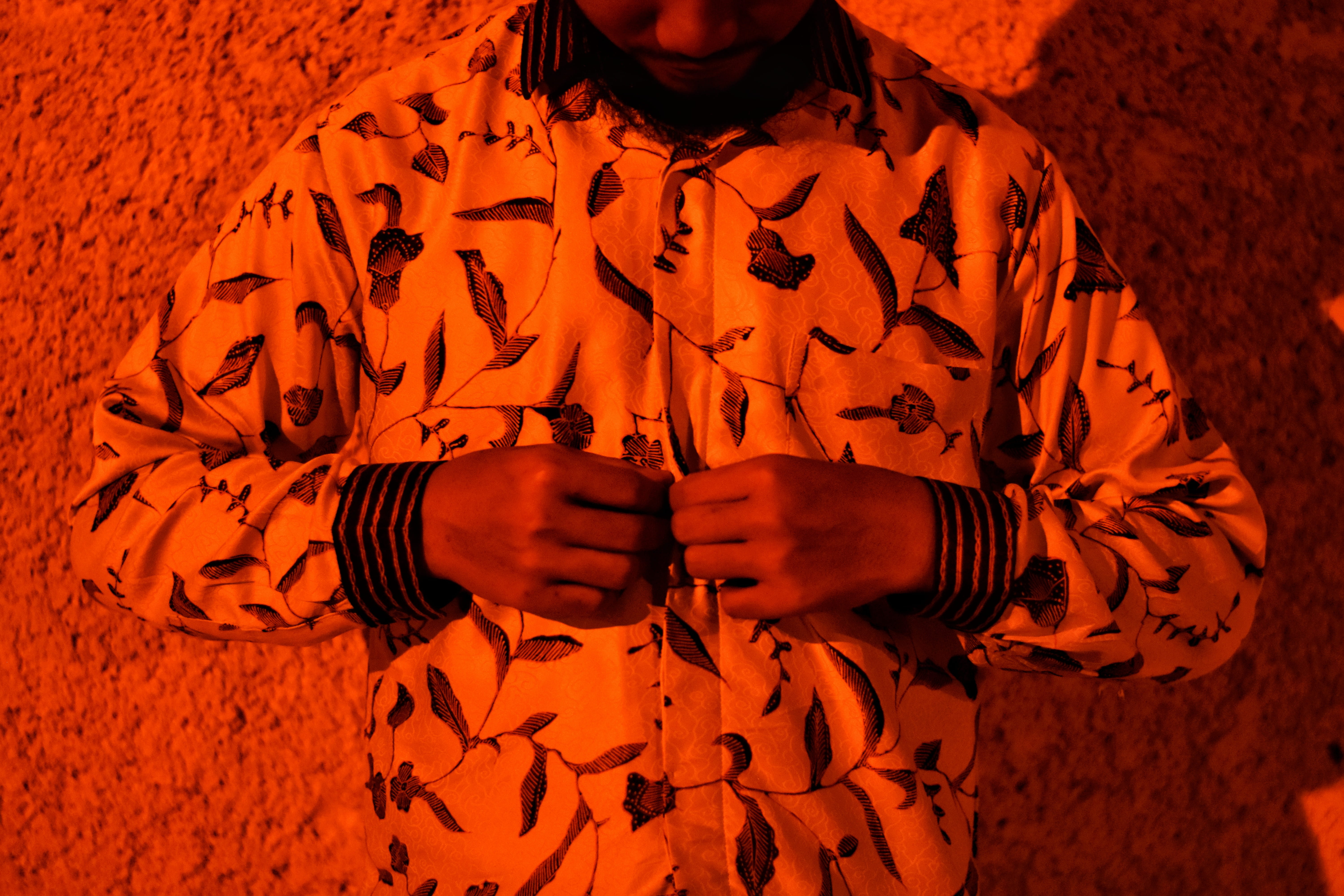 prison, person, apparel, sign, orange color, people, batik, 5K, red, jacket, front view, real people, warning sign, adult, human body part, coat, human hand, HD Wallpaper