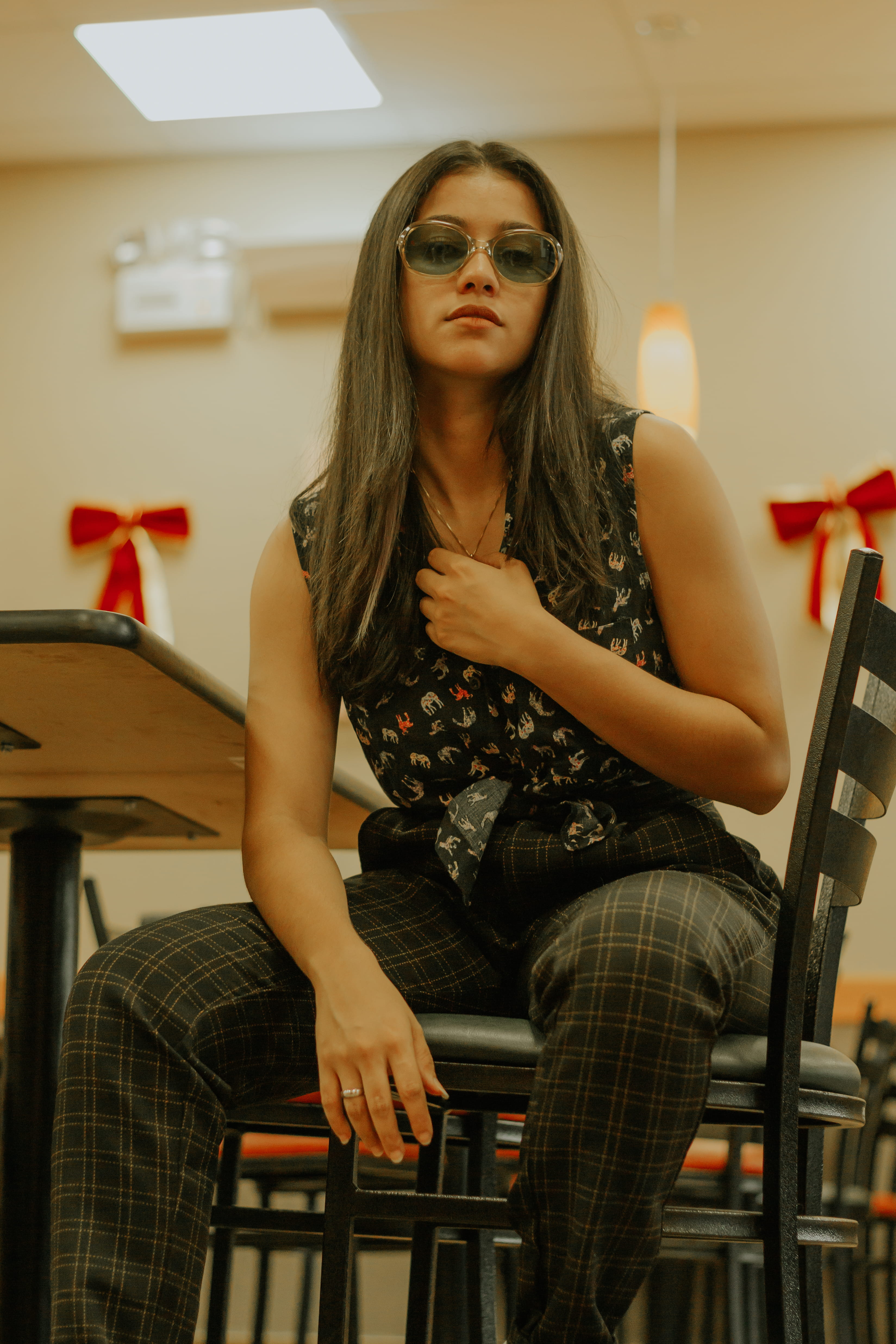 young adult, front view, long hair, flooring, clothing, electronics, real people, wood, display, apparel, young women, hardwood, chair, floor, top, three quarter length, Phone HD Wallpaper