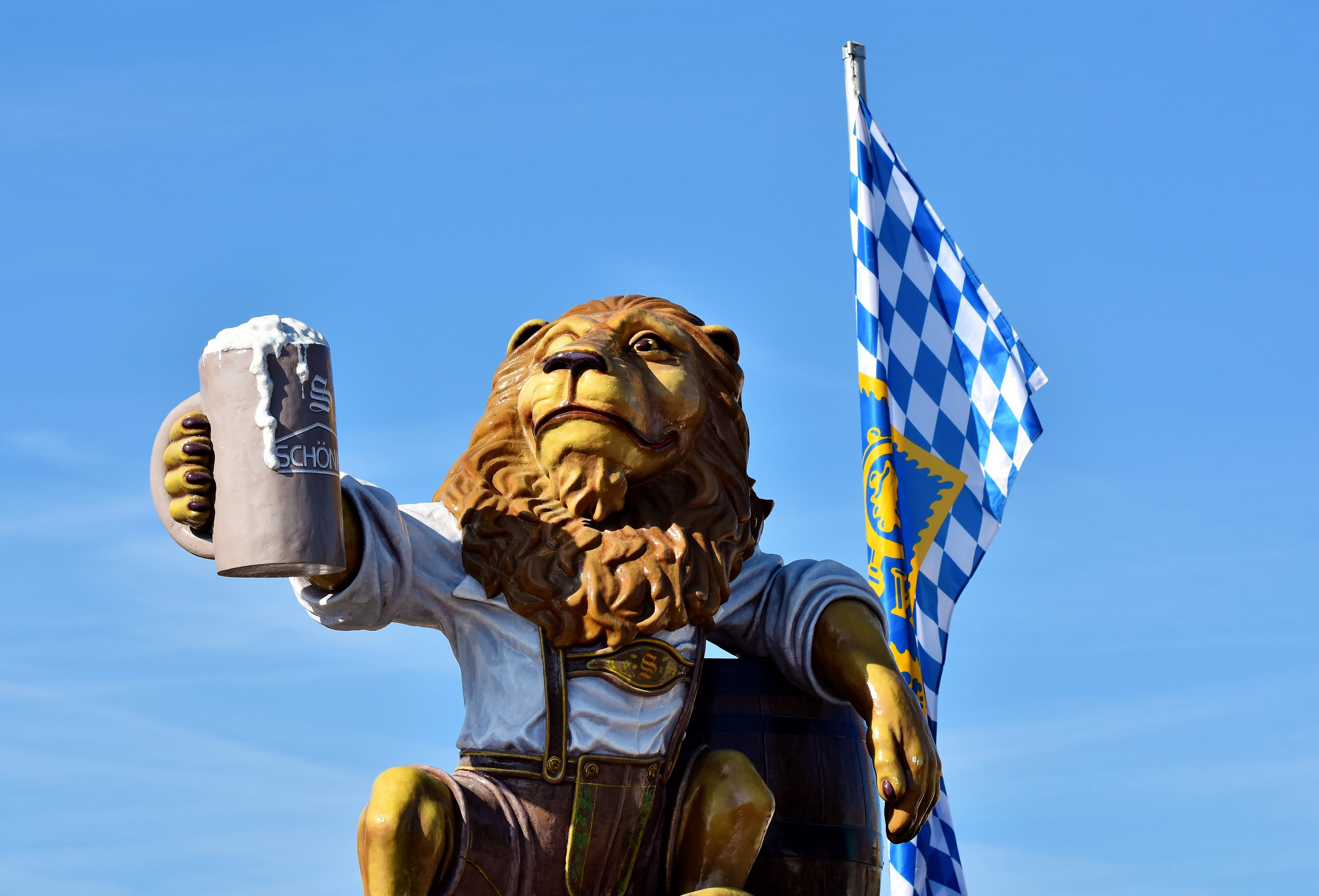 figure, bavaria, human representation, fair, lion, 5K, representation, flag, sunlight, folk festival, low angle view, architecture, beer tent, creativity, HD Wallpaper