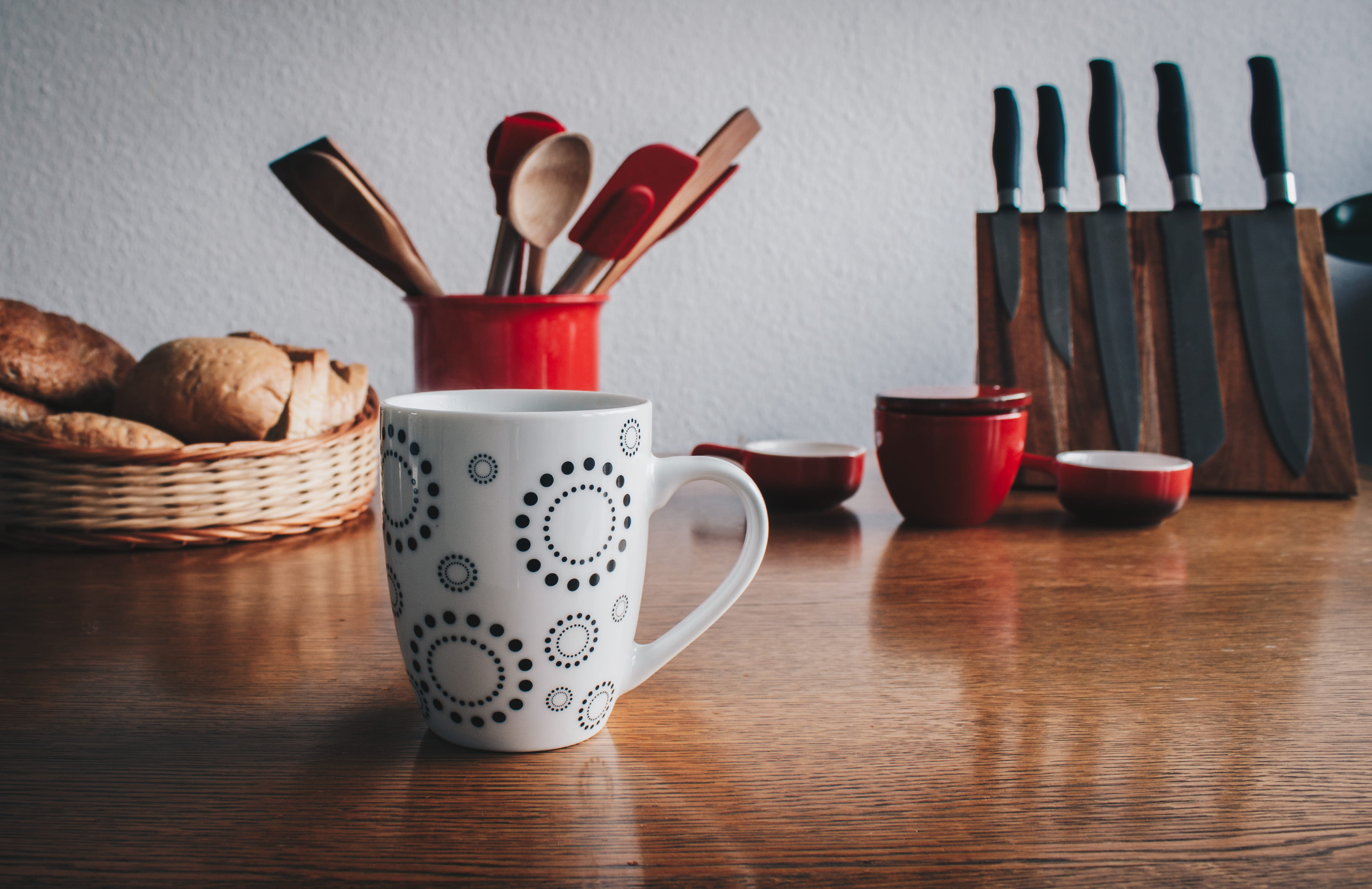 knives, eating utensil, mug, kitchenware, beside, wood - material, cup, breads, indoors, household equipment, 4K, cutlery, coffee cup, table, red, flatware, HD Wallpaper