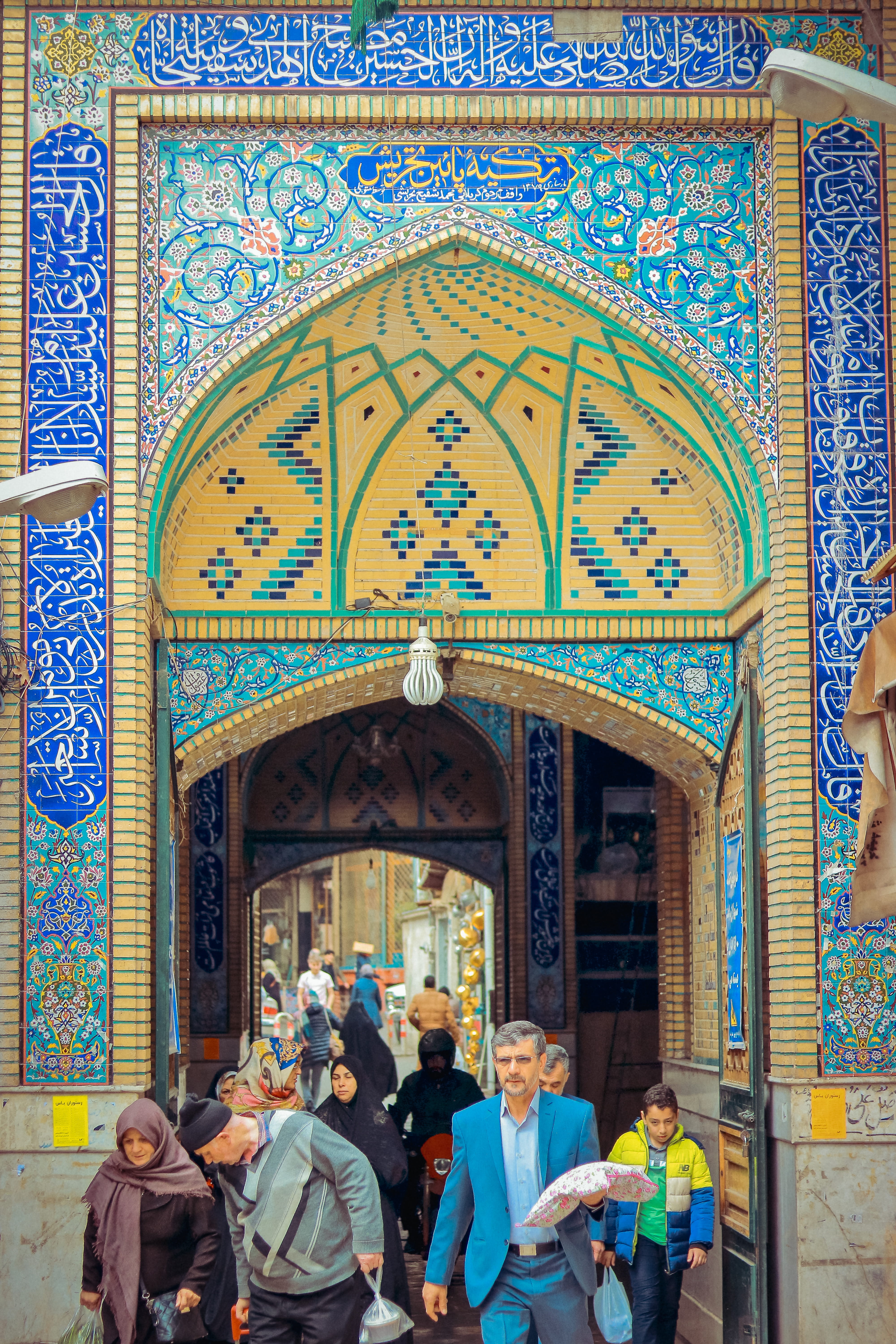 building, pattern, mural, blue, building exterior, day, temple, group of people, architecture, entrance, adult, arched, flagstone, people, art, spirituality, Phone HD Wallpaper