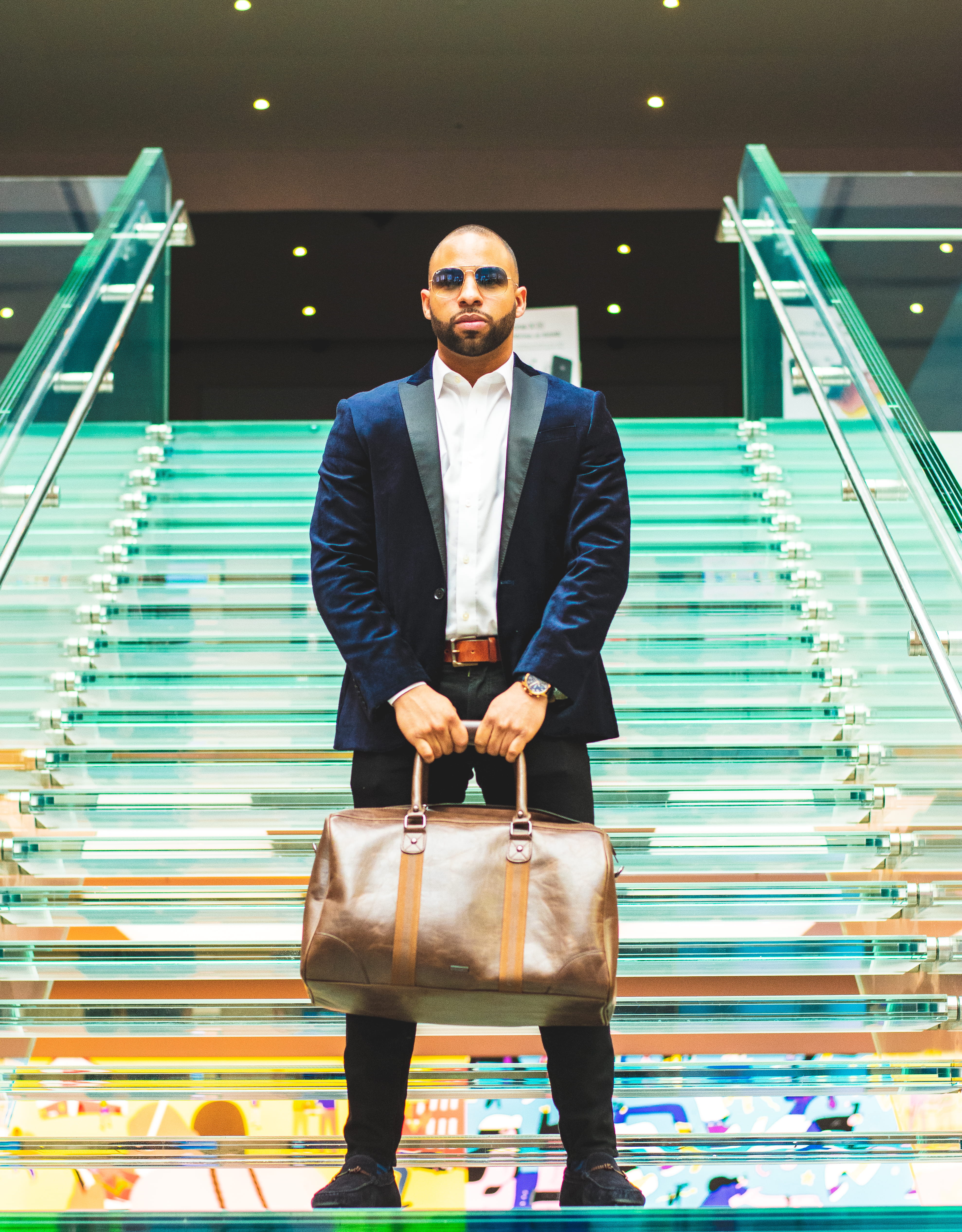 one person, sunglasses, portrait, young men, man, three quarter length, males, holding, suit, leisure activity, indoors, fashionable, duffel bag, fashion, Phone HD Wallpaper