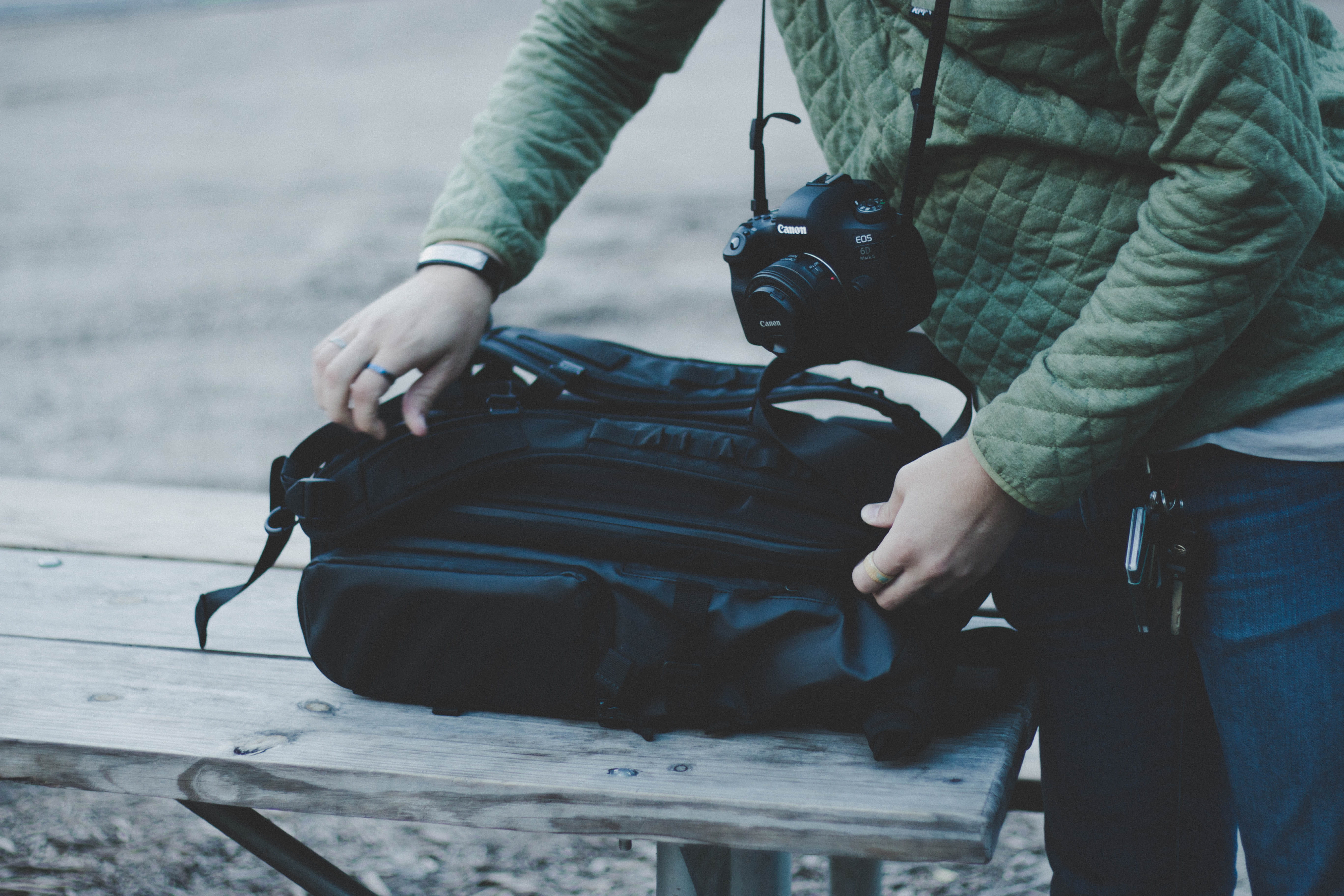 clothing, united states, holding, grey, day, duffel, human hand, warm clothing, one person, real people, lifestyles, outdoors, bag, opening, electronics, HD Wallpaper