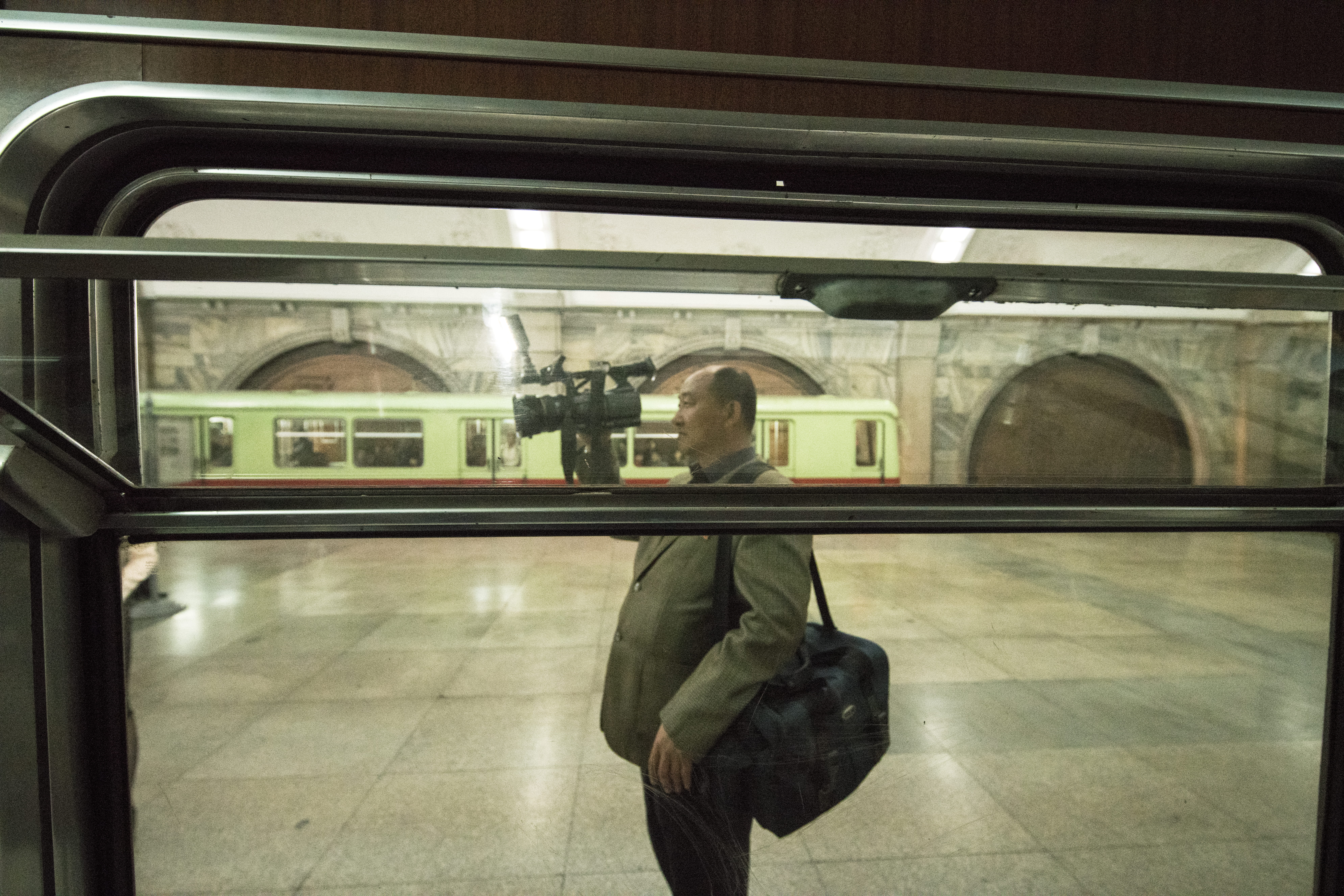 illuminated, vehicle, camera, duffel, public transportation, flooring, hairstyle, three quarter length, camera man, lighting, terminal, lifestyles, adult, HD Wallpaper