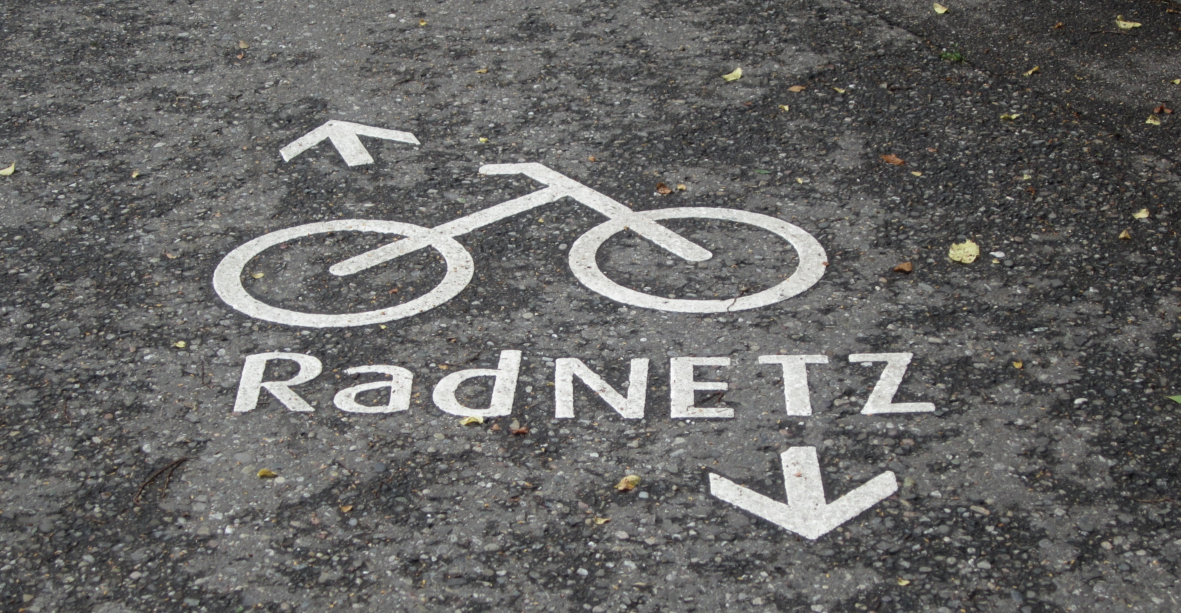 orb web, sign, tar, karl hildebrand, asphalt, transportation, marking, message, cycle path, text, symbol, road sign, wet, ground, city, white color, karl, HD Wallpaper
