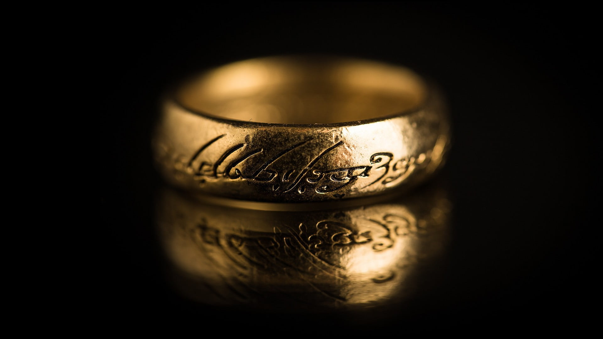 extreme close-up, no people, gold, text, currency, ring, symbol, savings, close-up, cultures, shiny, the dark background, ornate, wealth, gold Colored, HD Wallpaper