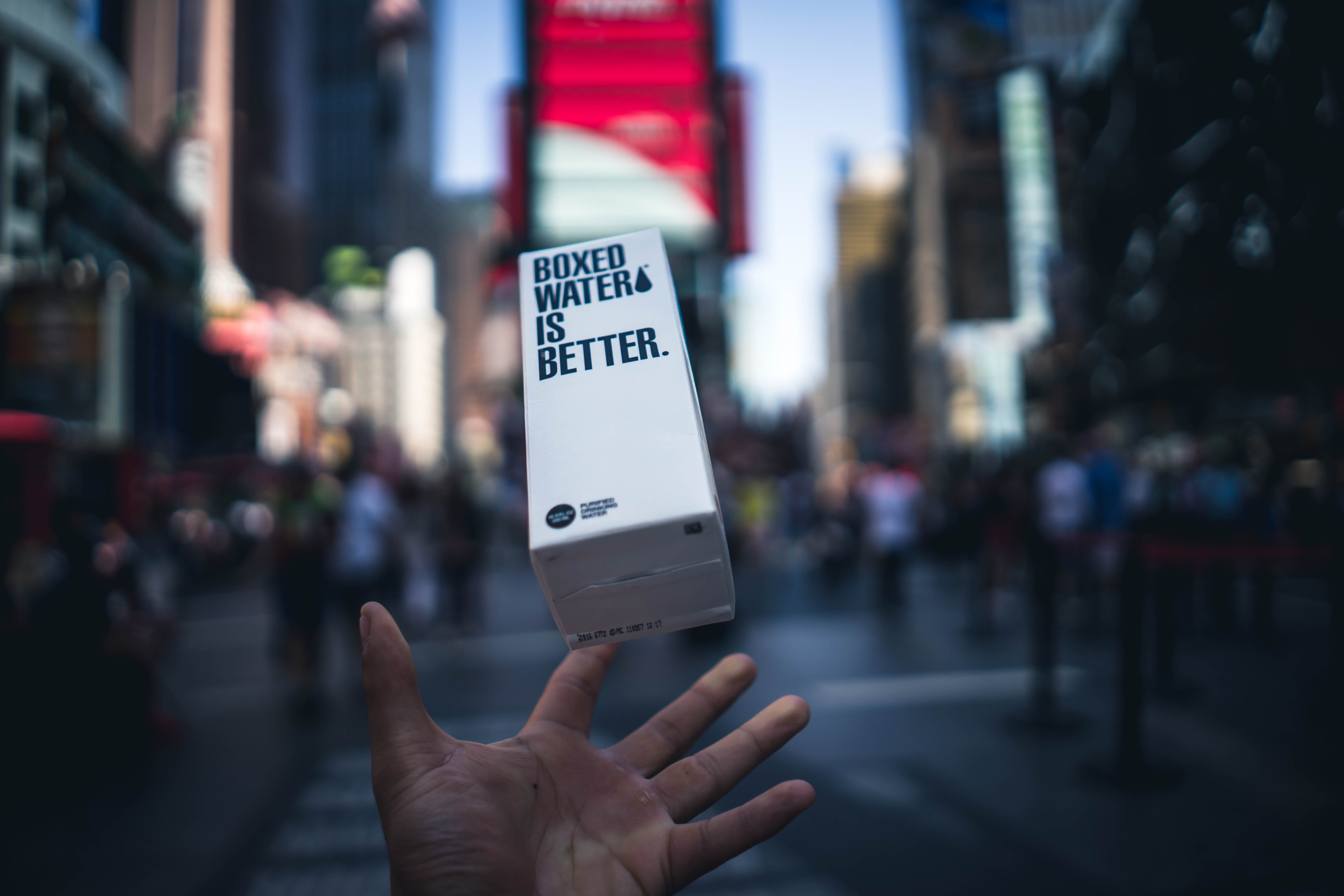 focus on foreground, day, communication, newyork, human finger, product, throw, throwing, box, person, boxedwater, finger, boxes, human hand, white, 5K, HD Wallpaper