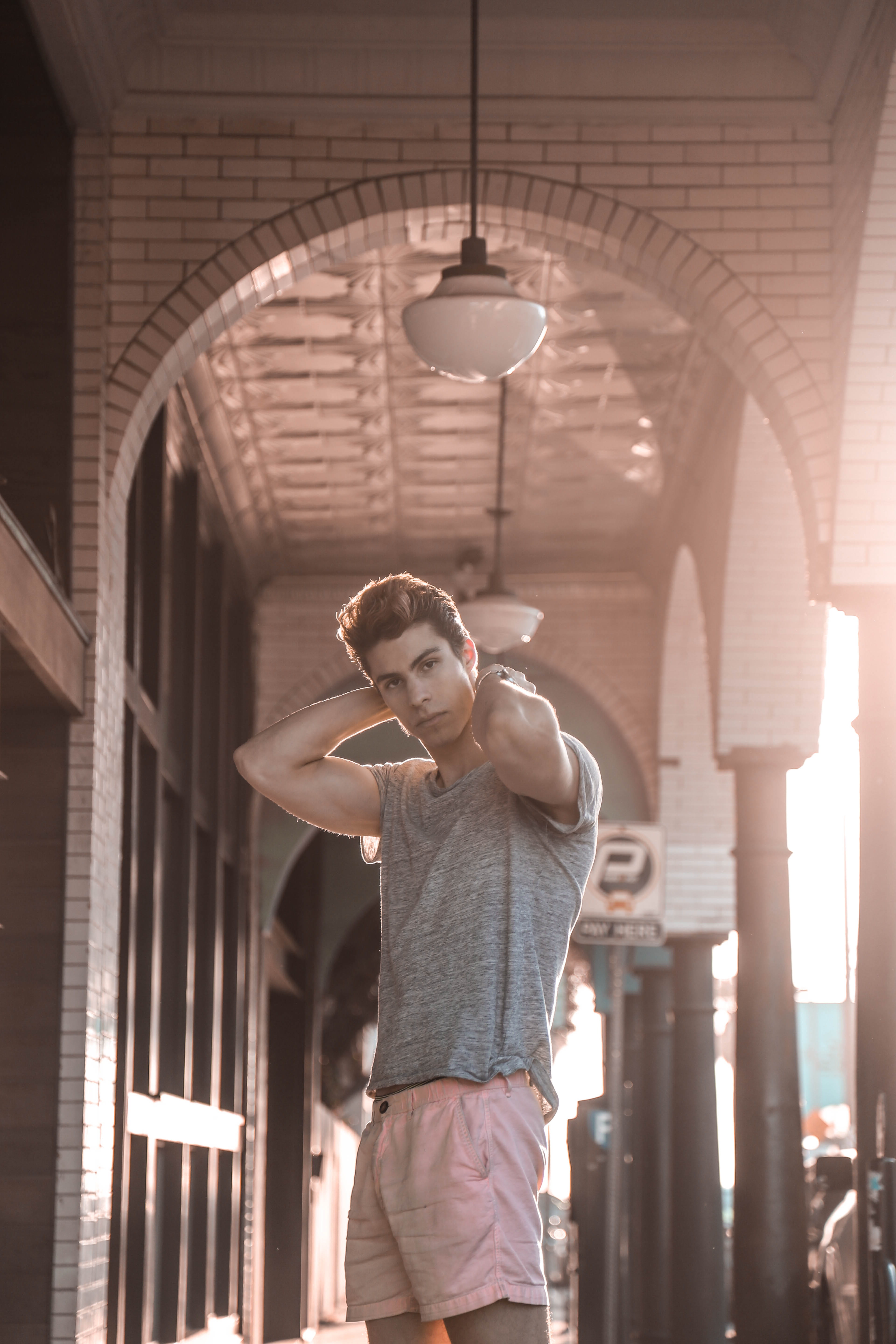 male, hairstyle, three quarter length, lamp, daytime, architecture, built structure, wall, beside, pendant, young men, arch, looking, leisure activity, Phone HD Wallpaper
