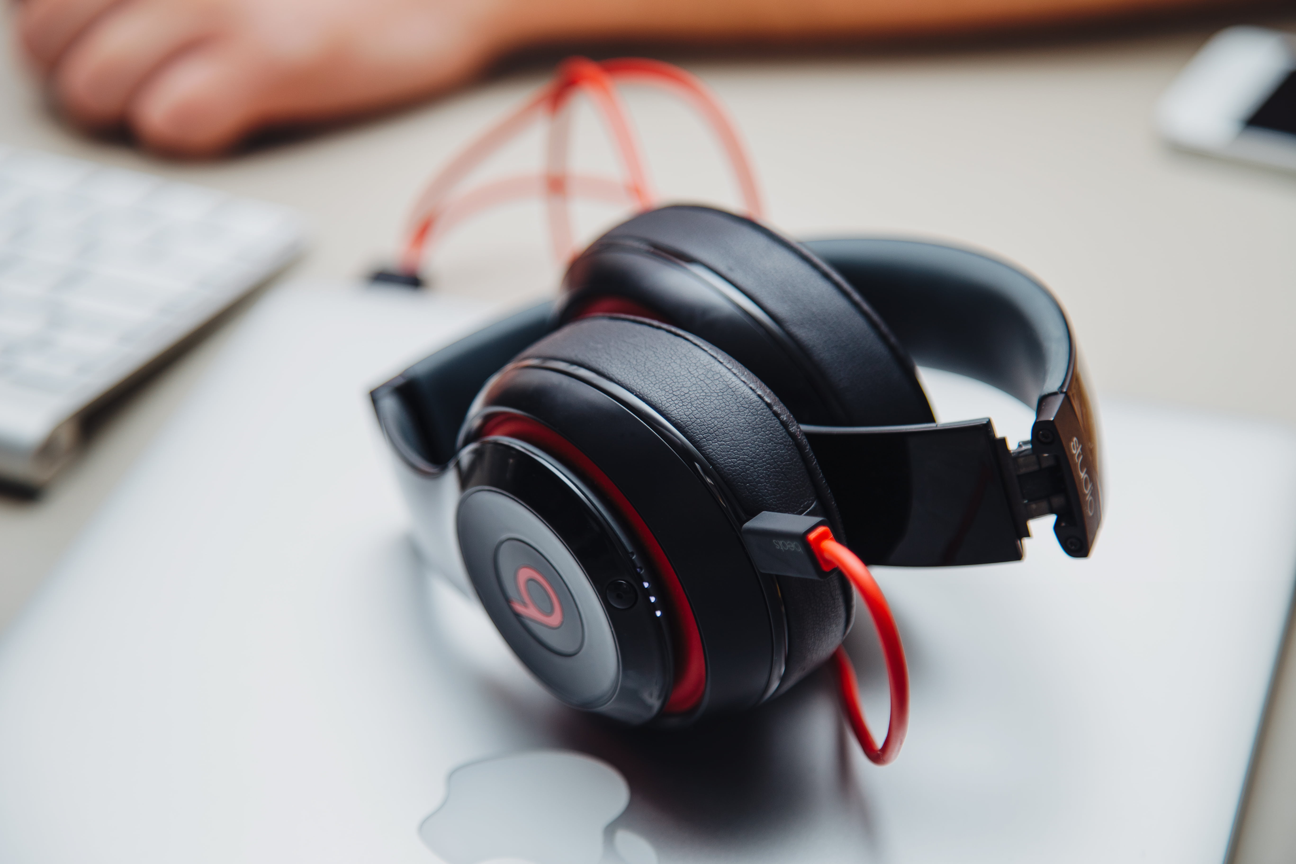 black color, macbook, wireless technology, beats, digital camera, human hand, close-up, human body part, day, dr, dre, computer, modern, photographic equipment, HD Wallpaper