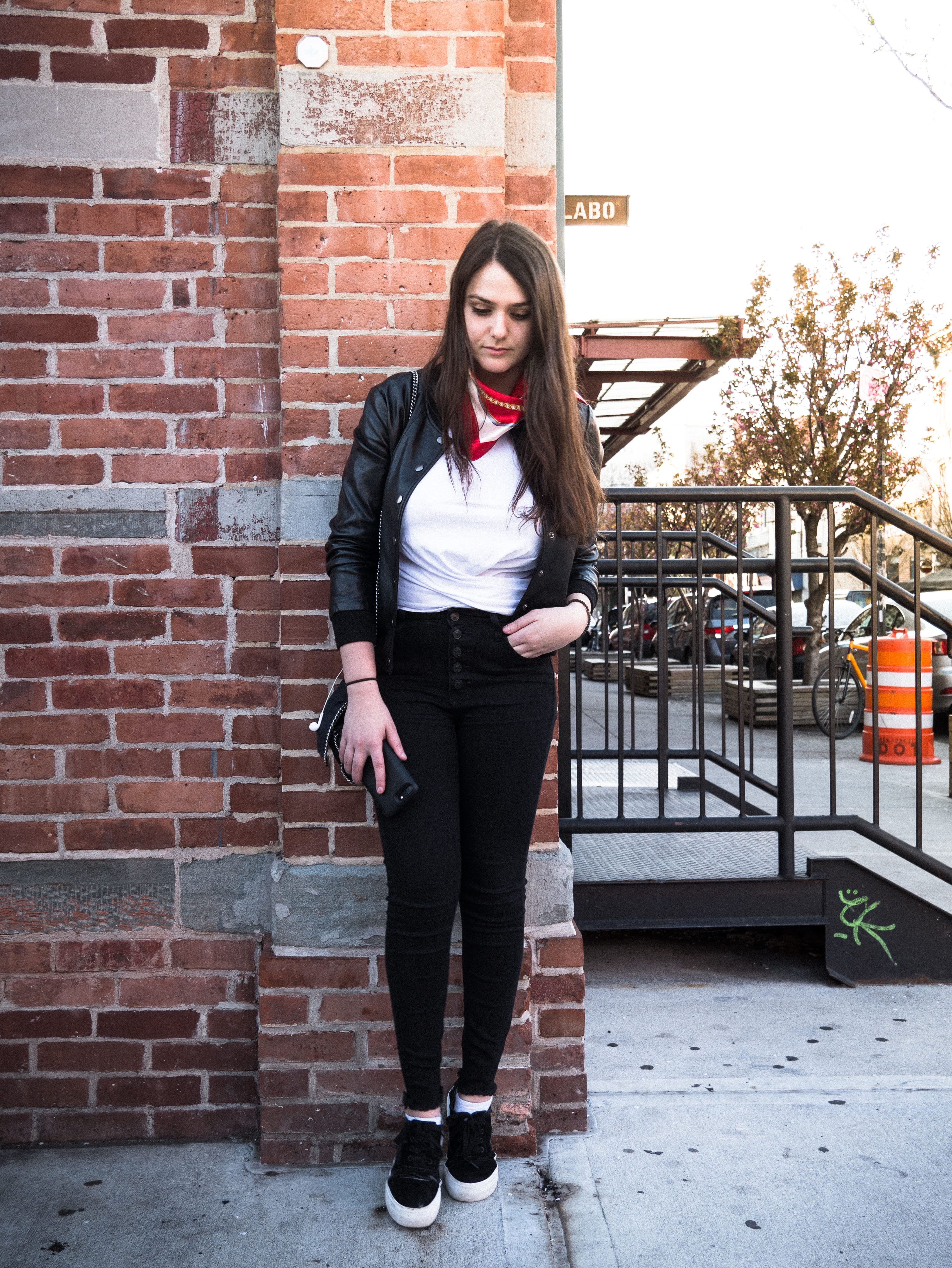 looking at camera, tones, smiling, lumix, hairstyle, girl, architecture, beautiful woman, young adult, portrait, ootd, brick wall, 4K, building exterior, Phone HD Wallpaper