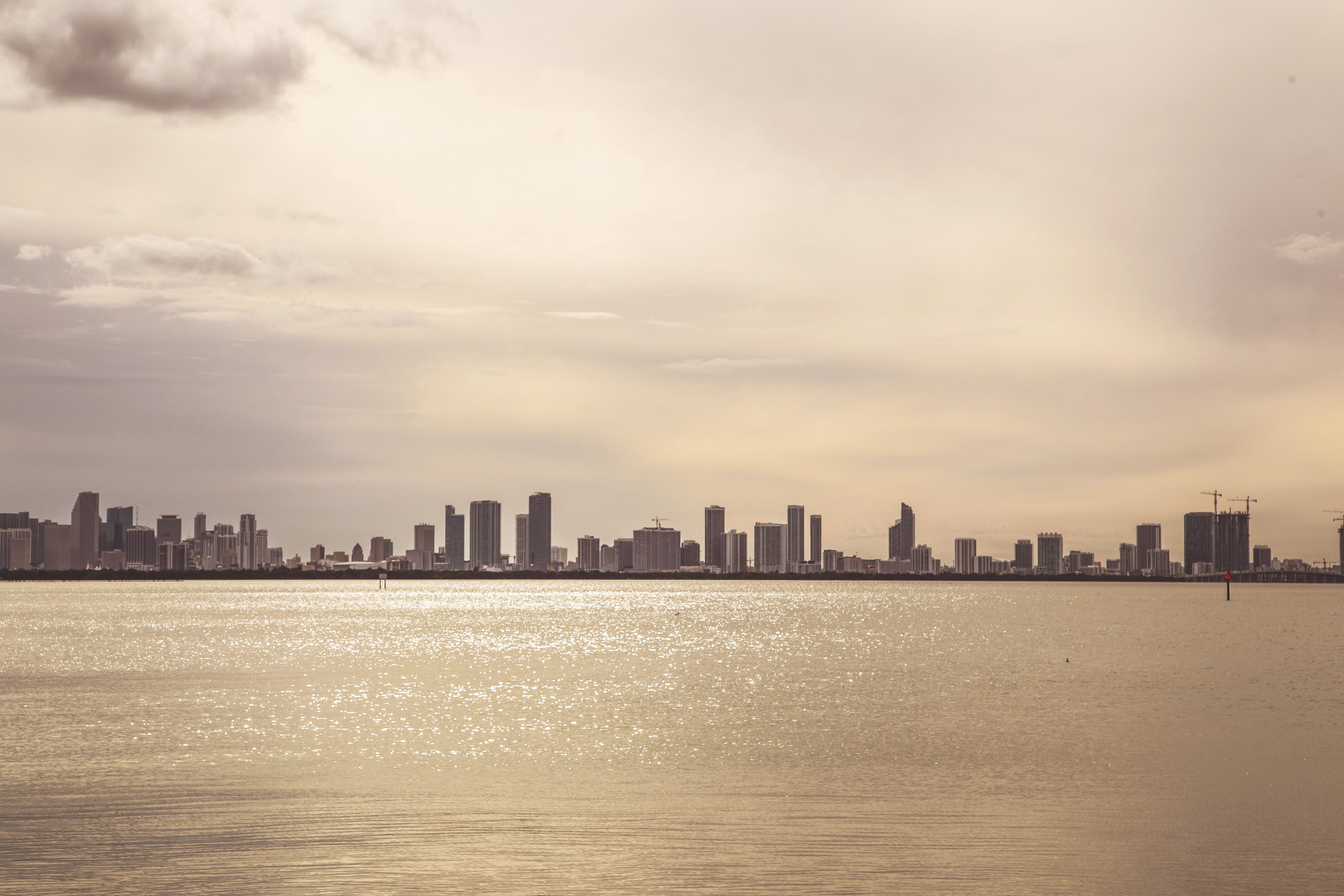 cloud - sky, sky, building exterior, office building exterior, 5K, landscape, waterfront, ocean, financial district, sea, architecture, town, centre, bay, HD Wallpaper