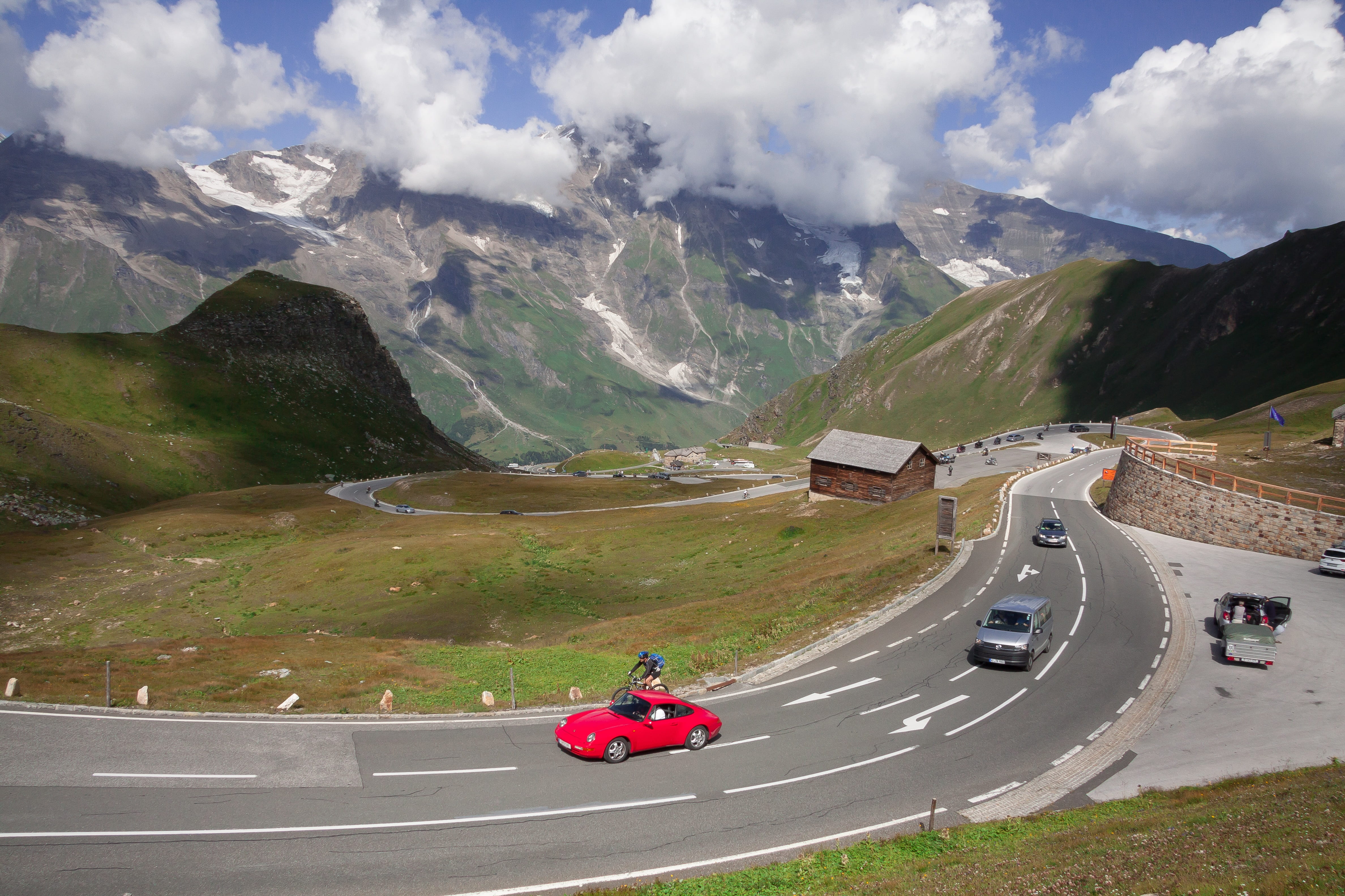 day, nature, beauty in nature, riding, national park, motorcycle, cloud - sky, travel, biker, mountain road, sun, high tauern, motor vehicle, people, road, HD Wallpaper