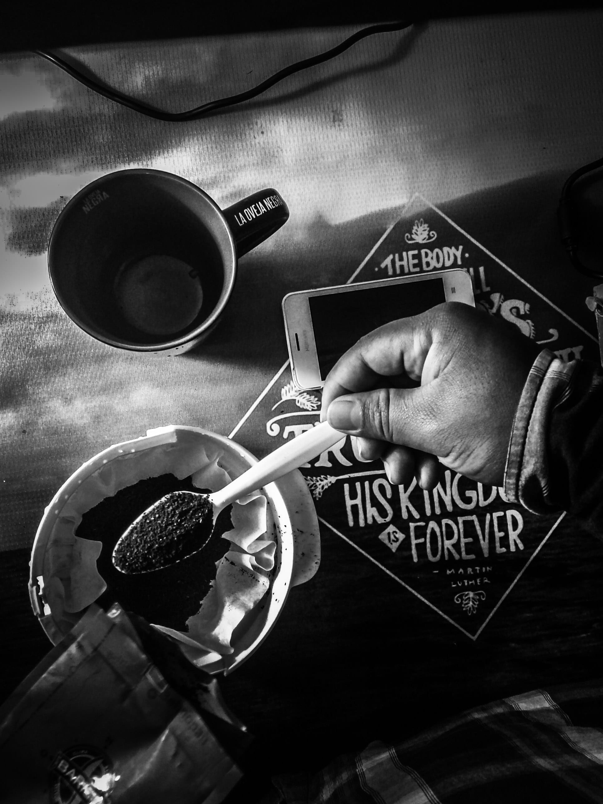 coffee, cup, 2K, one person, eating utensil, lifestyles, holding, food and drink, indoors, barista, drink, refreshment, text, finger, black sheep, human hand, Phone HD Wallpaper