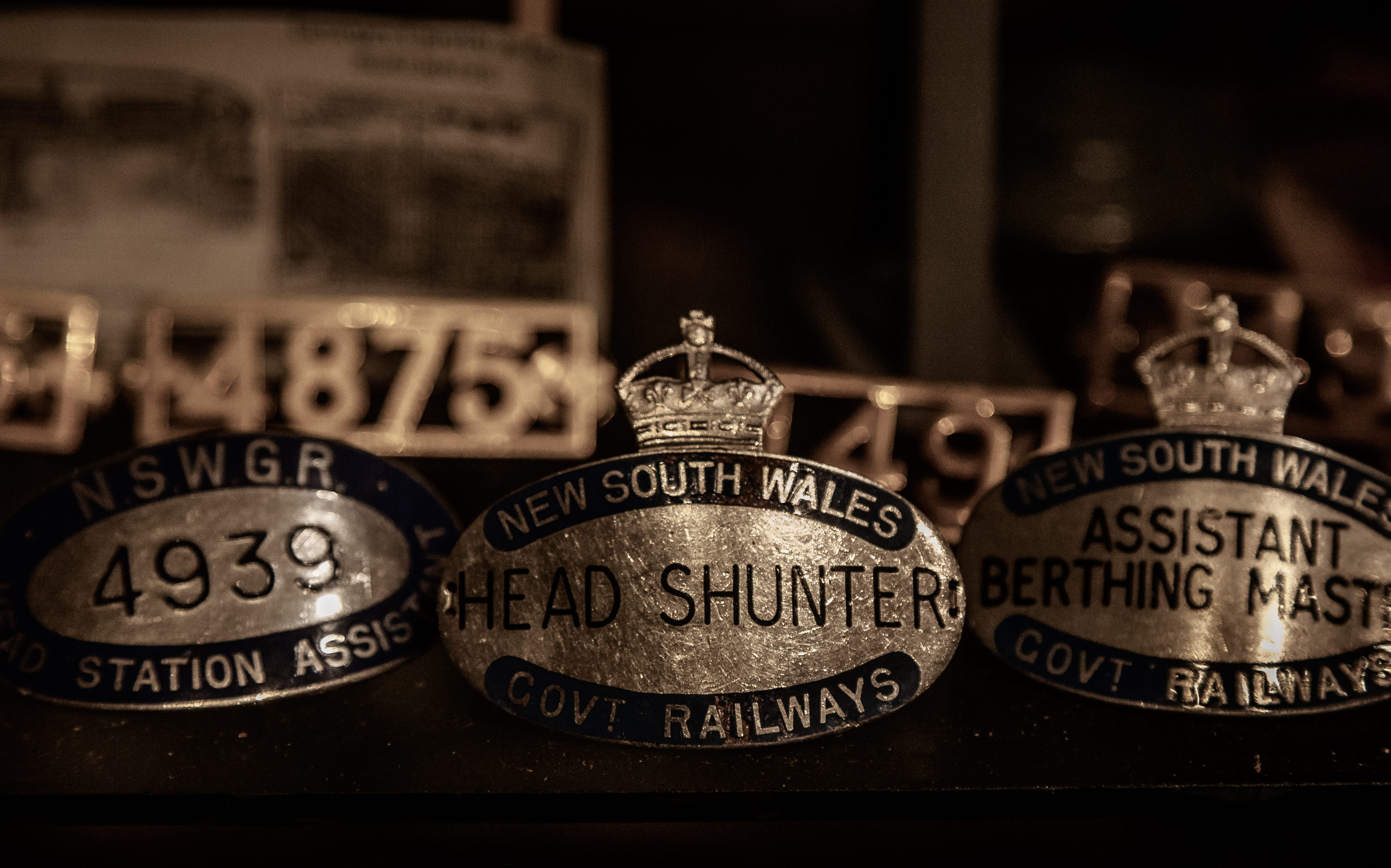 showcase, occupation, metal, communication, drink, group of objects, head shunter, business, brass, no people, still life, badge, close-up, indoors, engraved, HD Wallpaper
