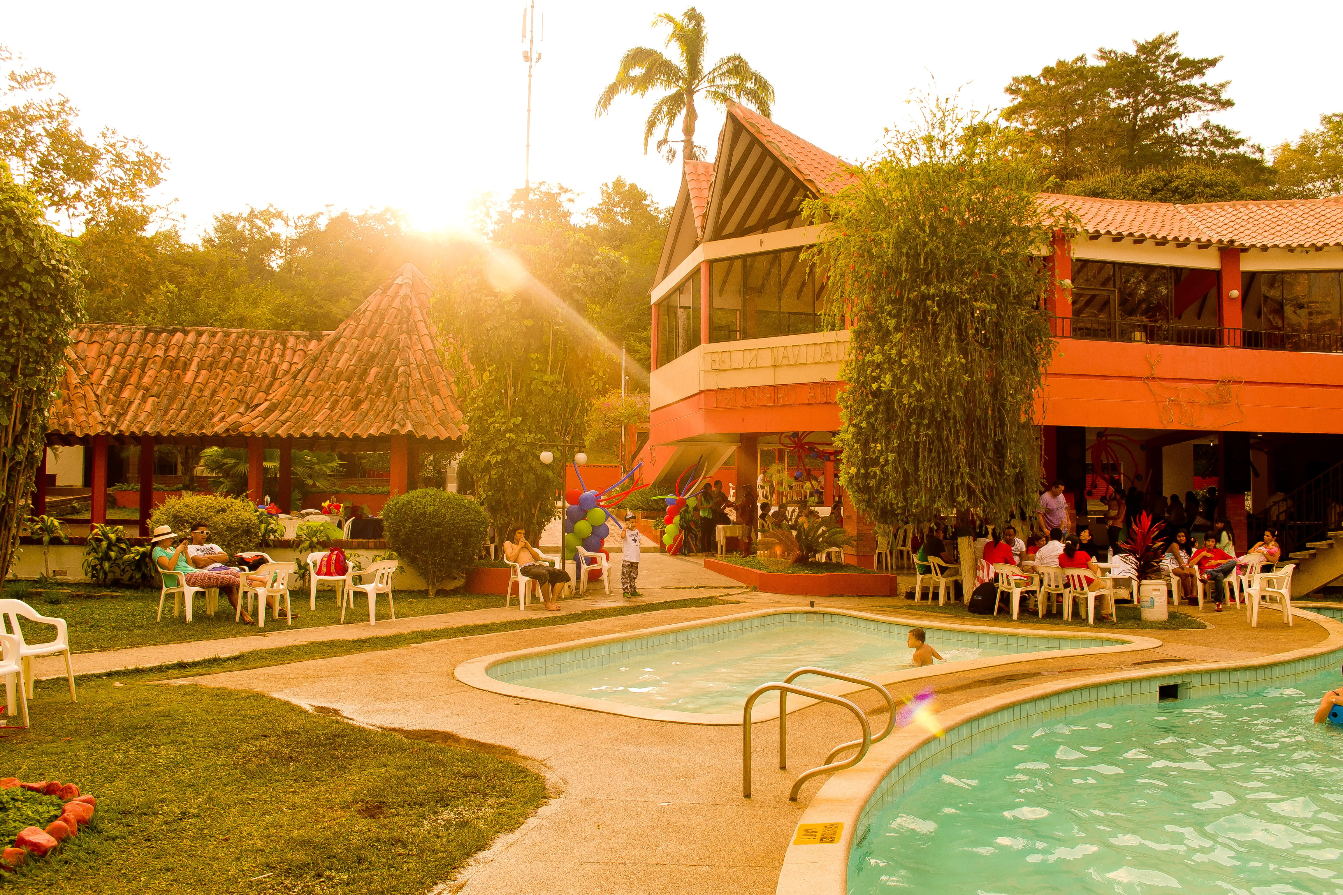 Sunset, swimming pool, tropical climate, outdoors, water, plant, nature, tree, hotel, Pool, group of people, 4K, Resource, leisure activity, travel destinations, HD Wallpaper