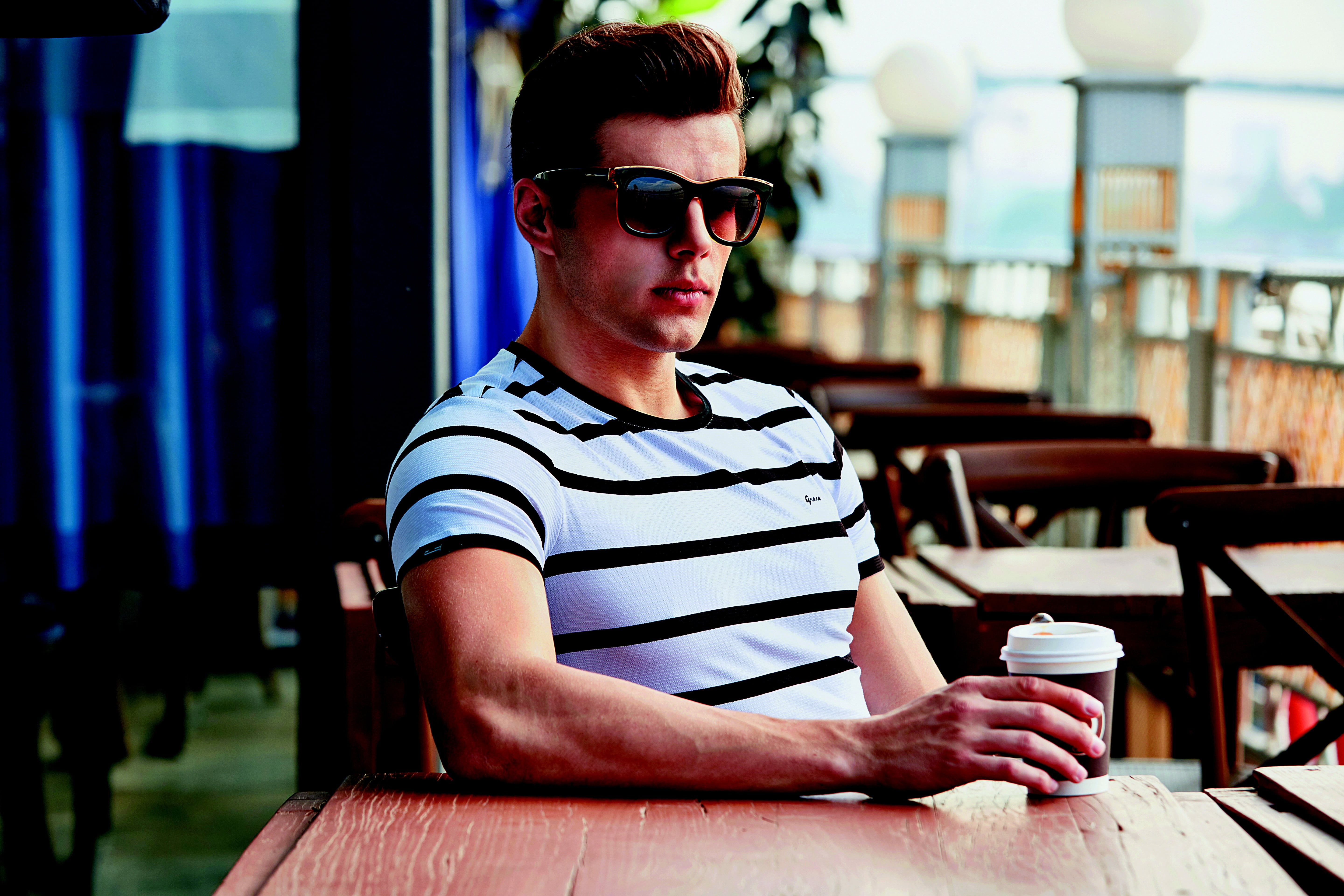 french apple, holding, real people, one person, mug, sunglasses, coffee, leisure activity, outdoors, fashion, fashion business, casual clothing, cafe, young men, HD Wallpaper