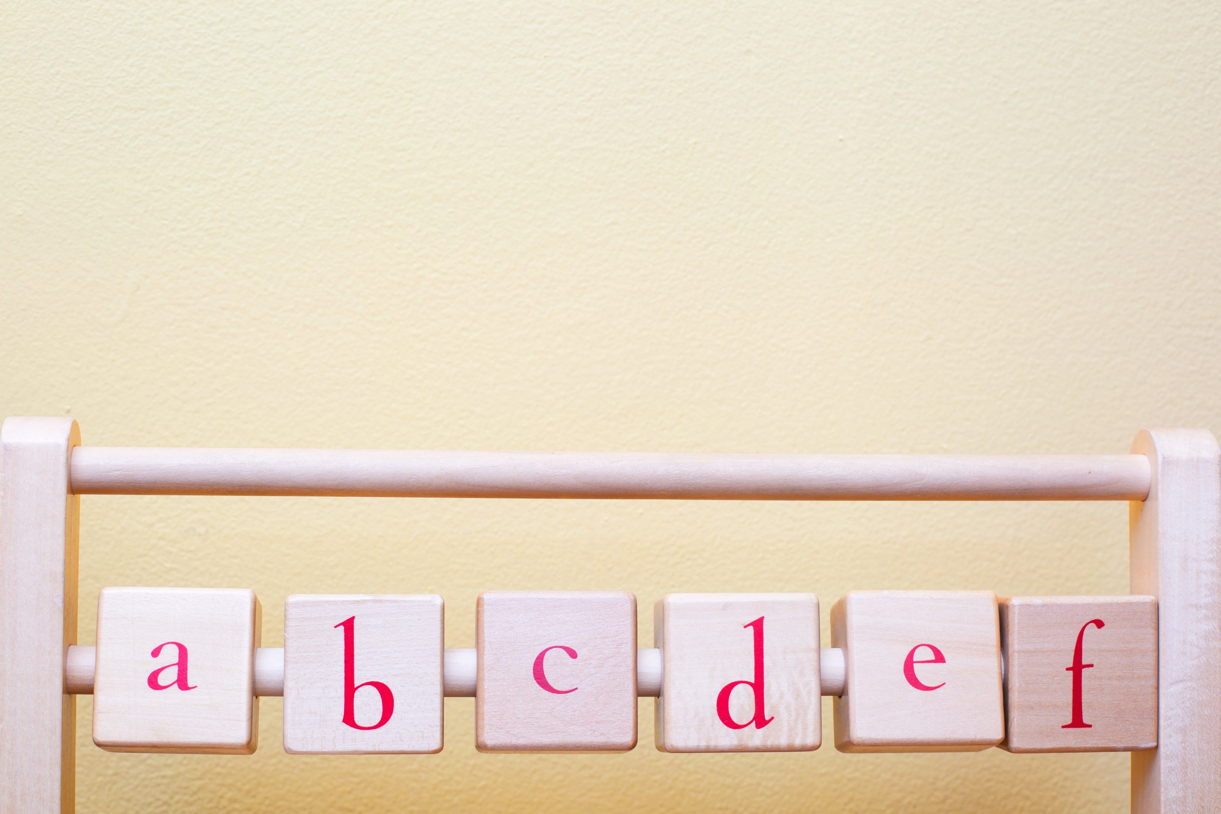 multi colored, copy space, organization, yellow, alphabet, letter, Toys, 4K, wood - material, nursery, in a row, message, side by side, beige background, HD Wallpaper