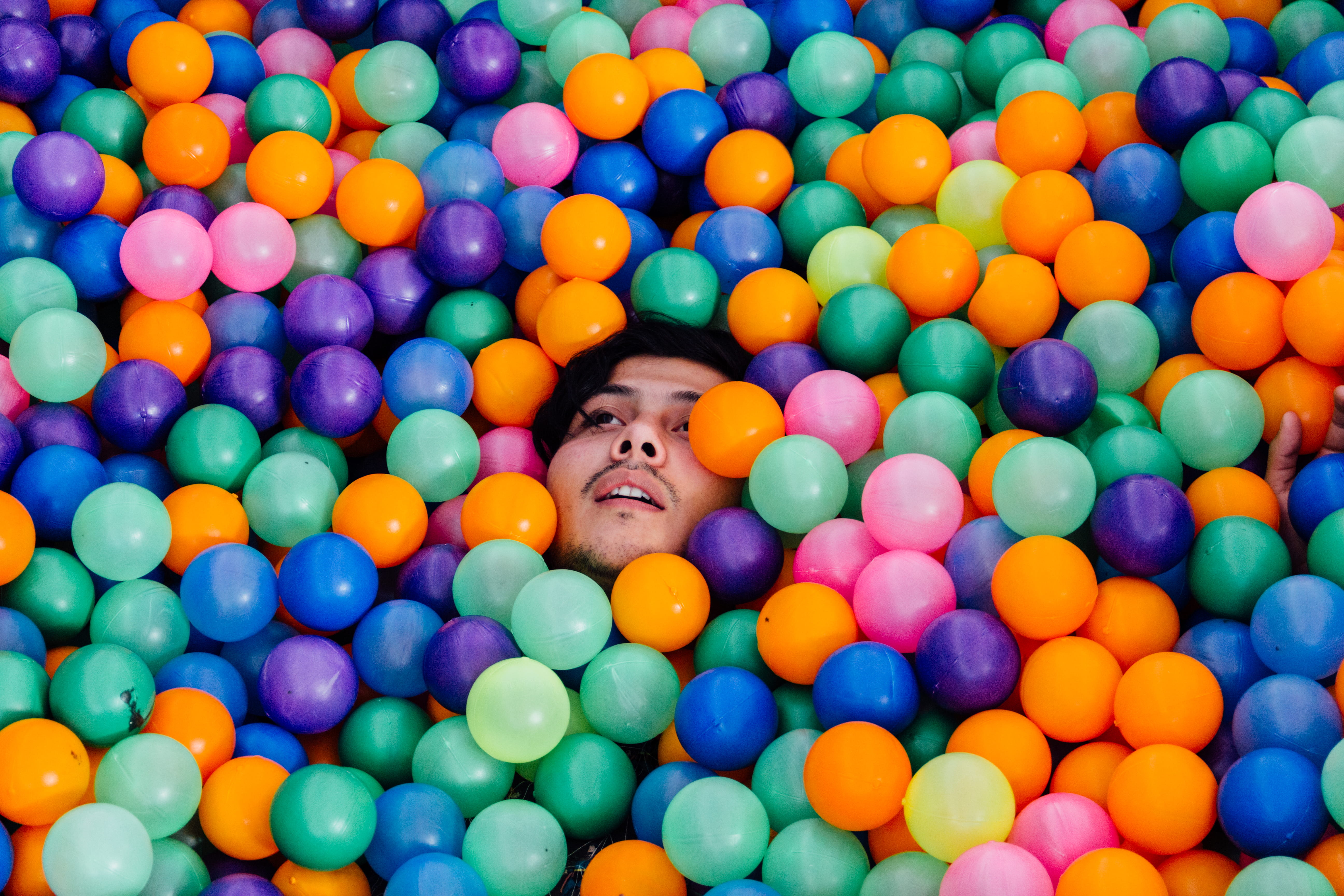 abstract, landscape, globe, one person, physco, man, color, pit, leisure activity, child, conceptual, 5K, indoors, happy, enjoyment, ball, lying, fun, HD Wallpaper