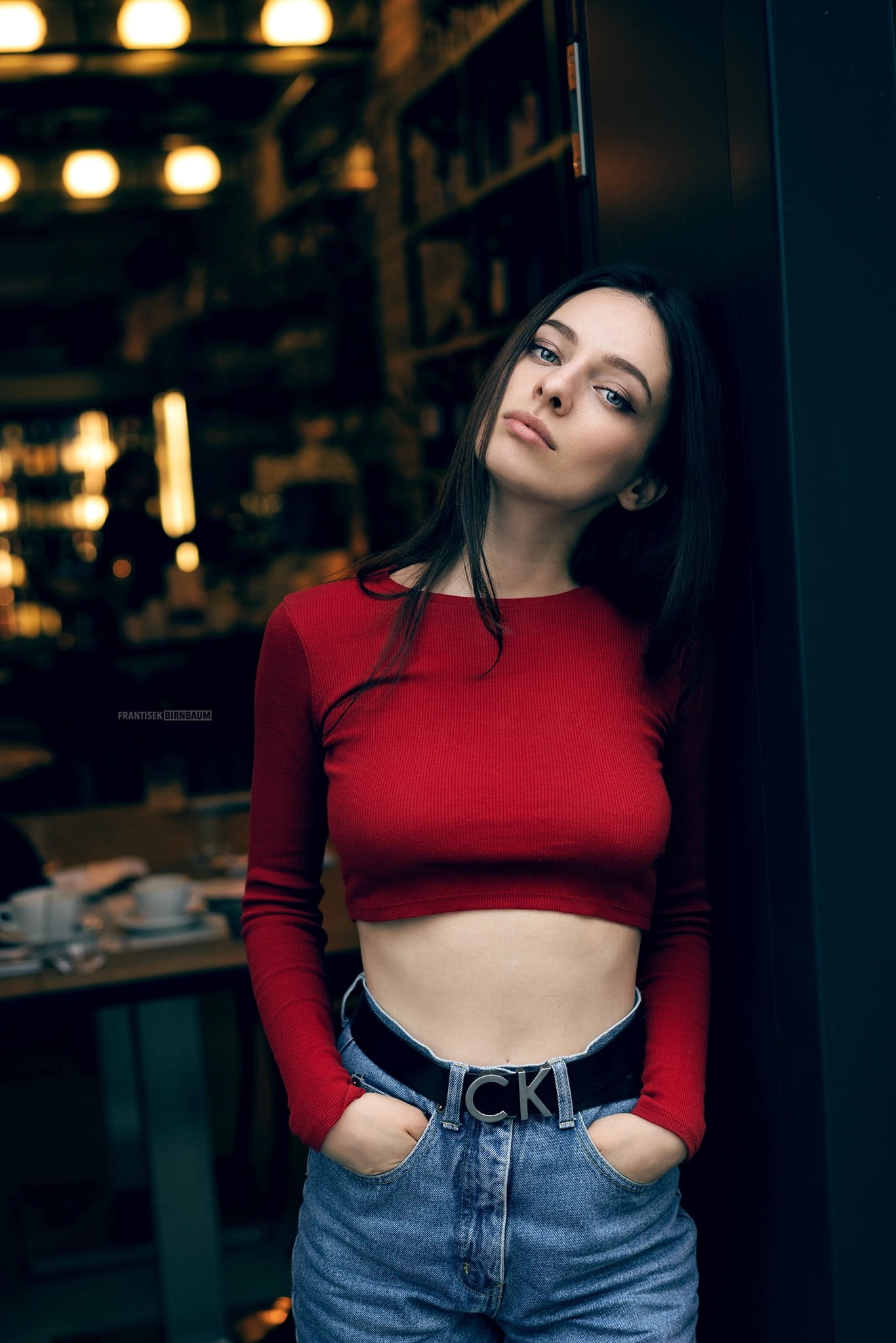 jeans, Frantisek Birnbaum, model, looking at viewer, women, brunette, portrait display, red clothing, high waisted, blue eyes, 1080P, depth of field, Phone HD Wallpaper