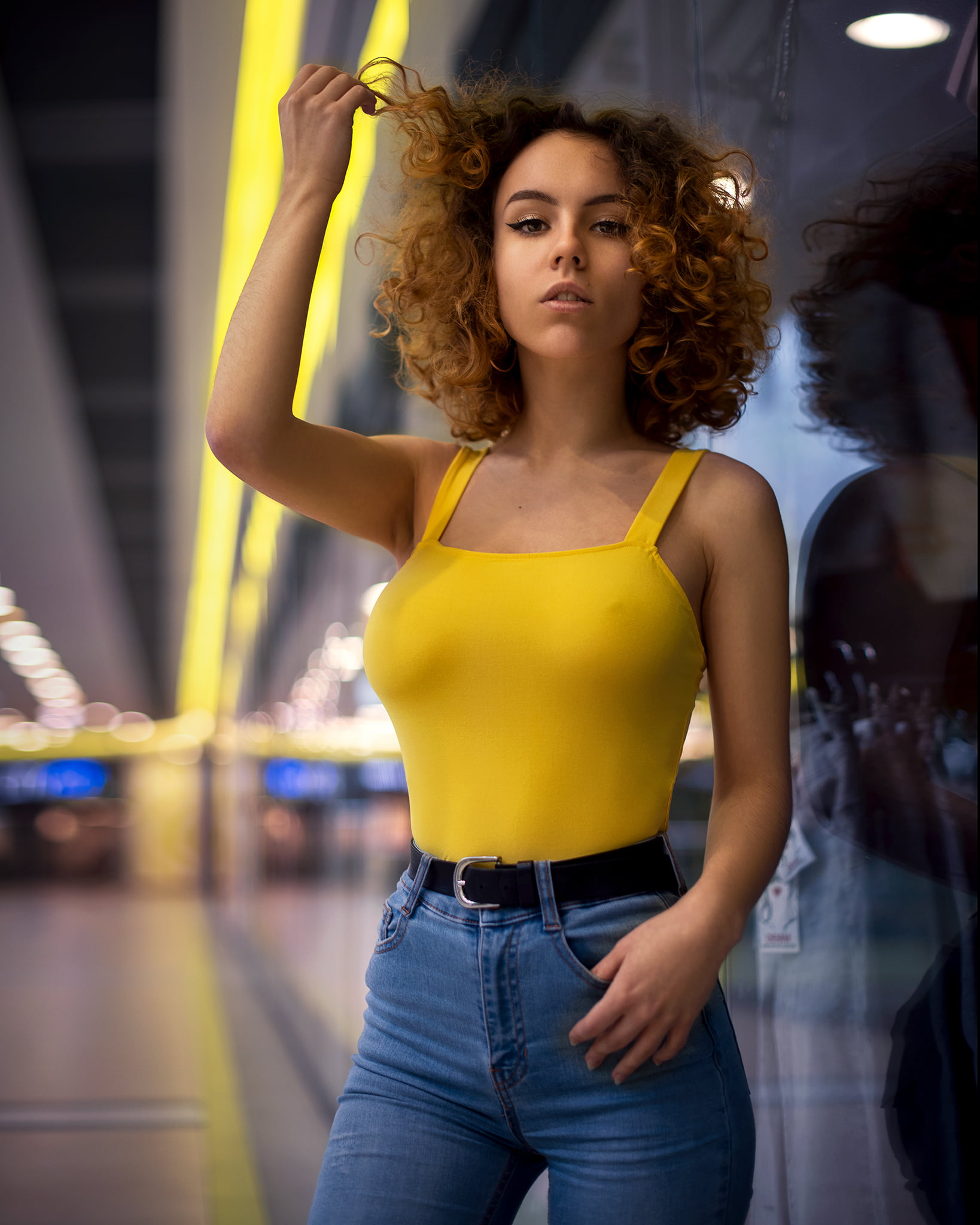 1080P, bare shoulders, standing, portrait display, curly hair, model, high waisted, brunette, jeans, women, tight clothing, depth of field, women indoors, Phone HD Wallpaper