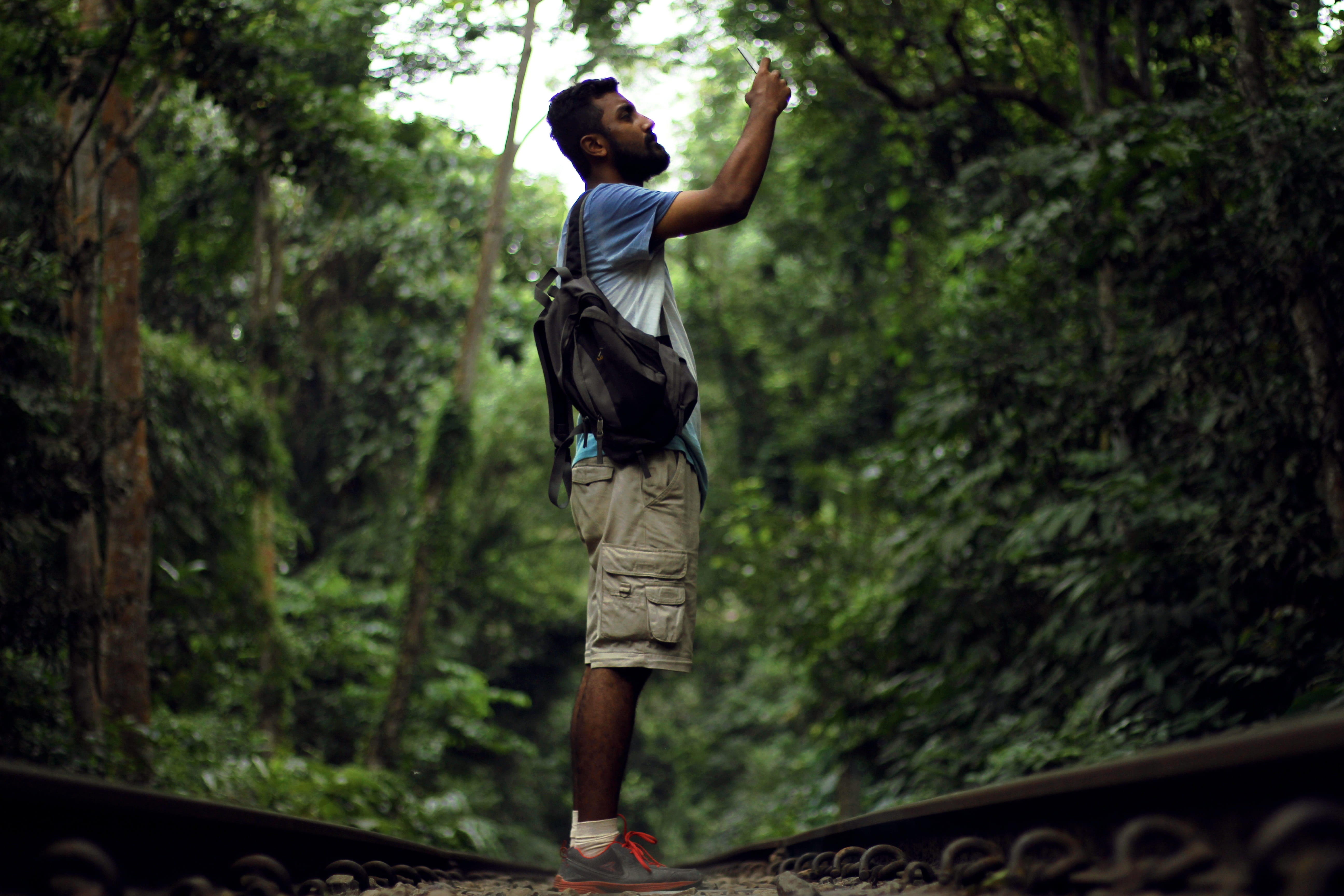 day, sport, 5K, adult, casual clothing, jungle, person, plant, young adult, tree, hiking, human arm, one person, full length, outdoor, jumping, man, male, HD Wallpaper