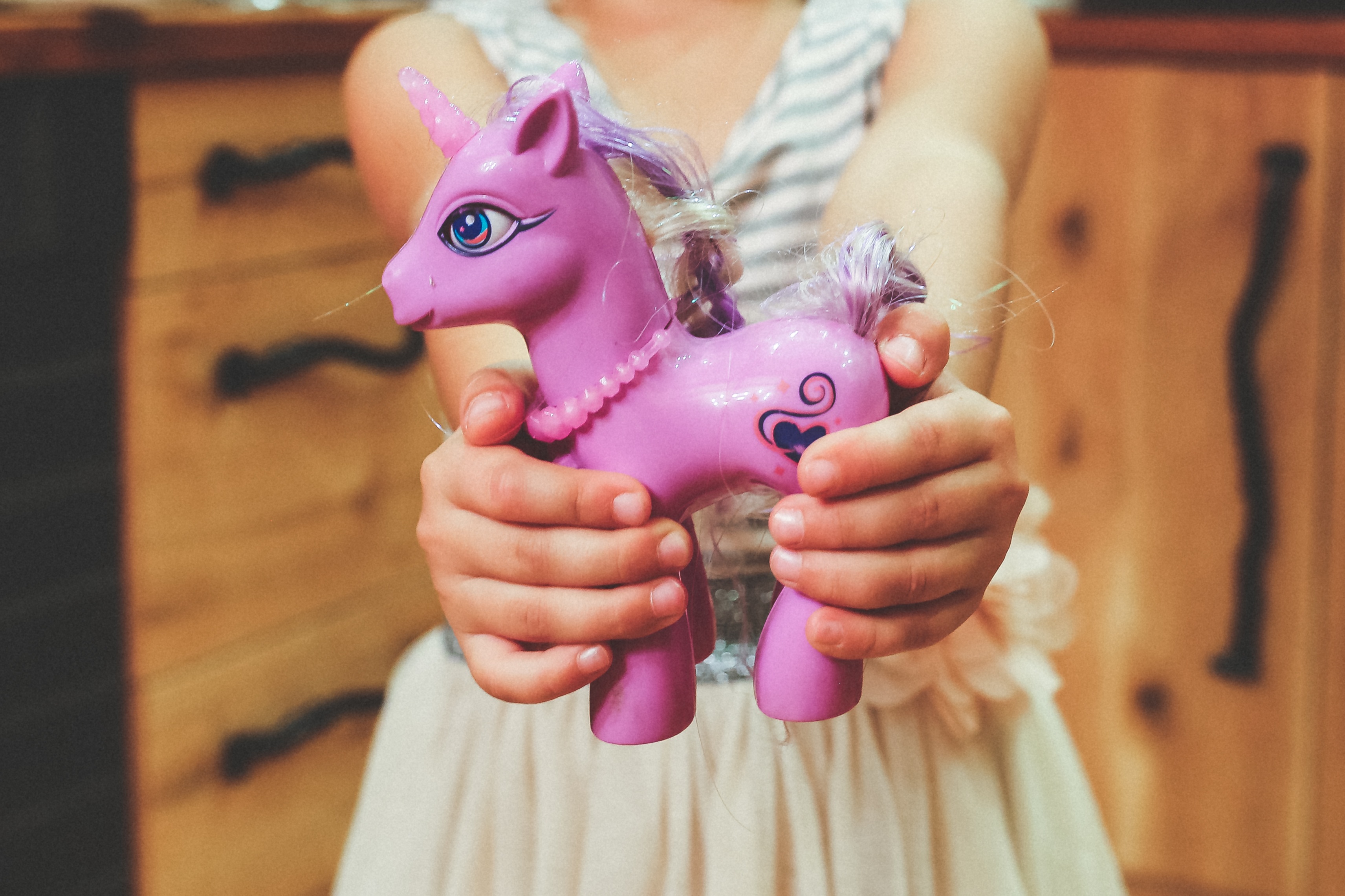 front view, carrying, banking, business, hold, unicorn, childhood, savings, people, indoors, hand, coin Bank, horse, girls, midsection, holding, purple, HD Wallpaper