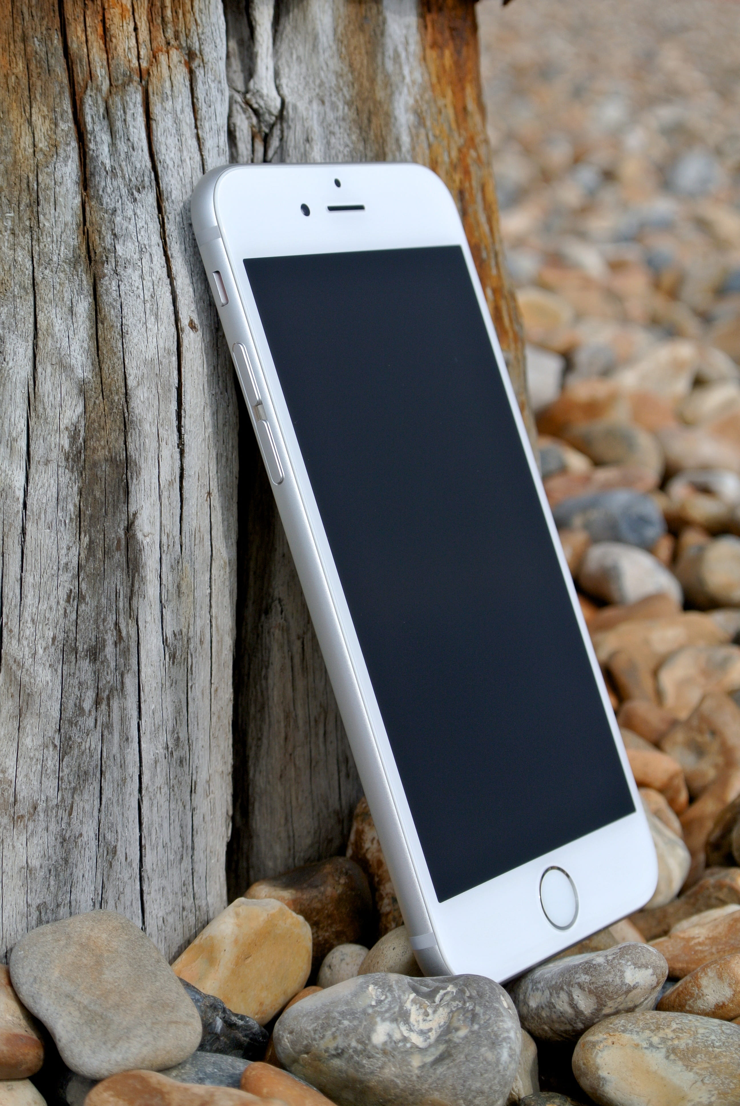 stones, rocks, table, solid, 4K, outdoors, connection, wood, portability, device, still life, screen, communication, close-up, silver, iphone 6 plus, cellular, Phone HD Wallpaper