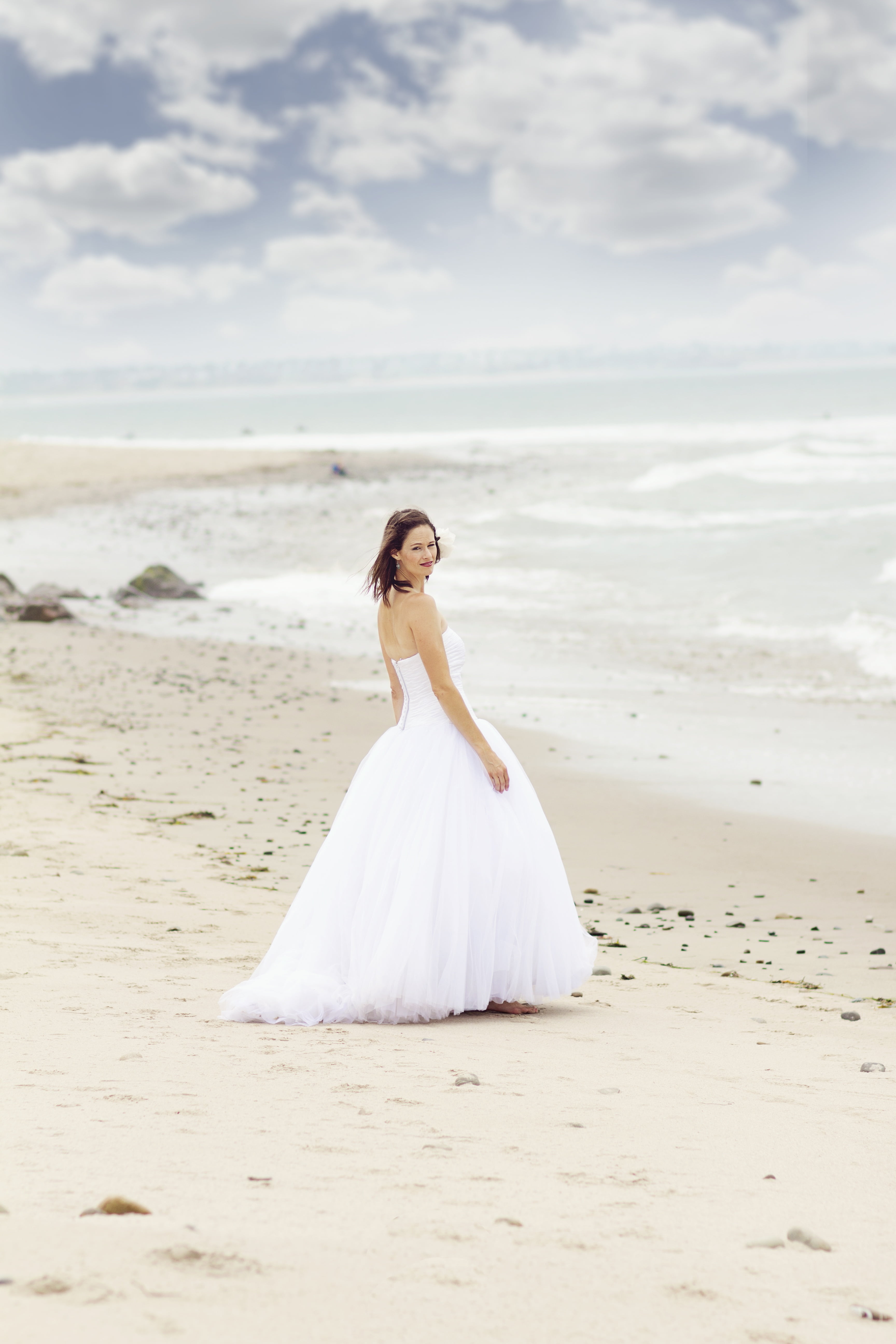 standing, one Person, waves, woman, cloud - sky, summer, outdoors, young Adult, seashore, white, water, newlywed, sea, daytime, attractive, 5K, wedding Dress, Phone HD Wallpaper