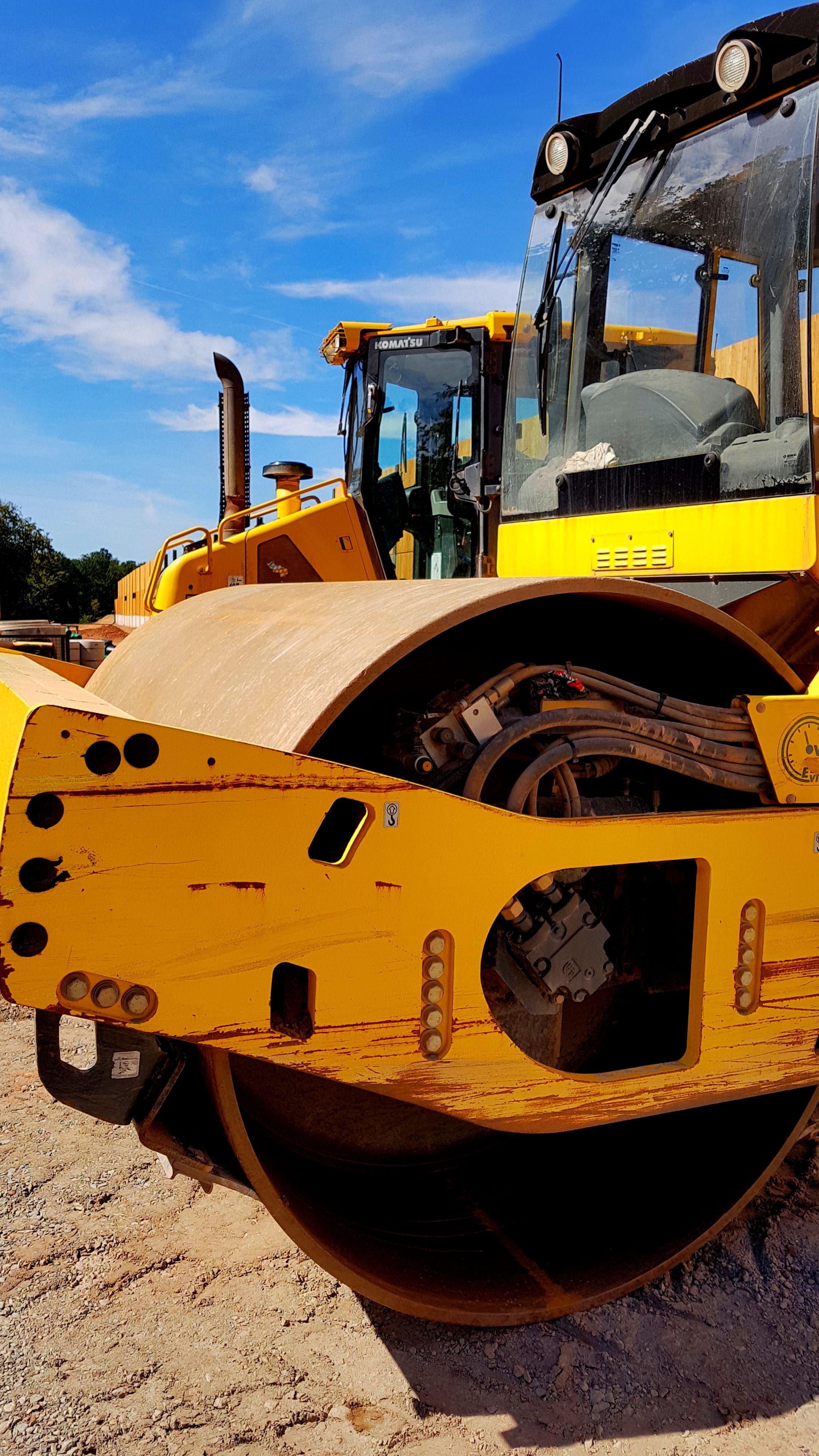 4K, blue, yellow, wheel, construction machinery, construction vehicle, roll, field, rusty, mode of transportation, junkyard, day, land vehicle, landscape, Phone HD Wallpaper