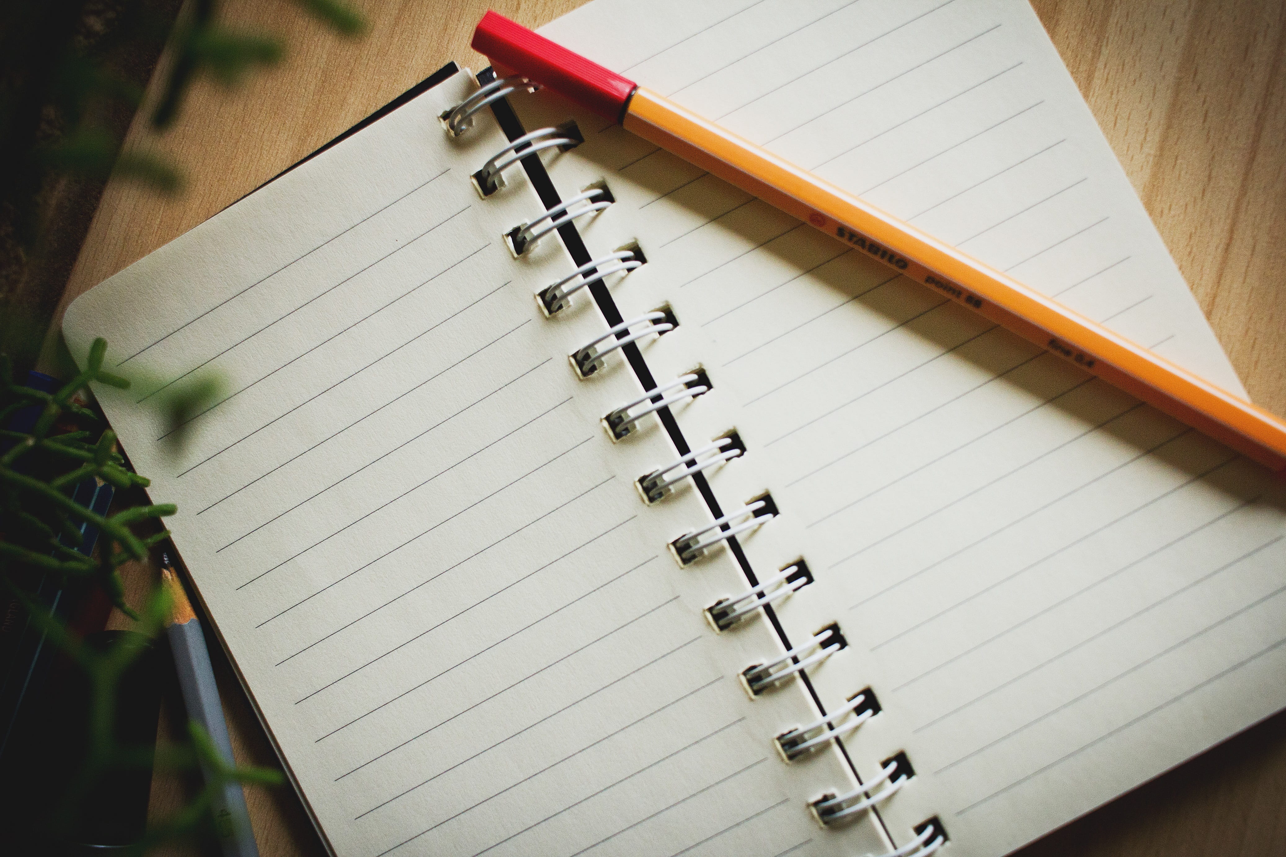 indoors, publication, focus on foreground, book, spiral, page, pages, journal, items, open, pen, education, no people, spiral notebook, still life, table, HD Wallpaper