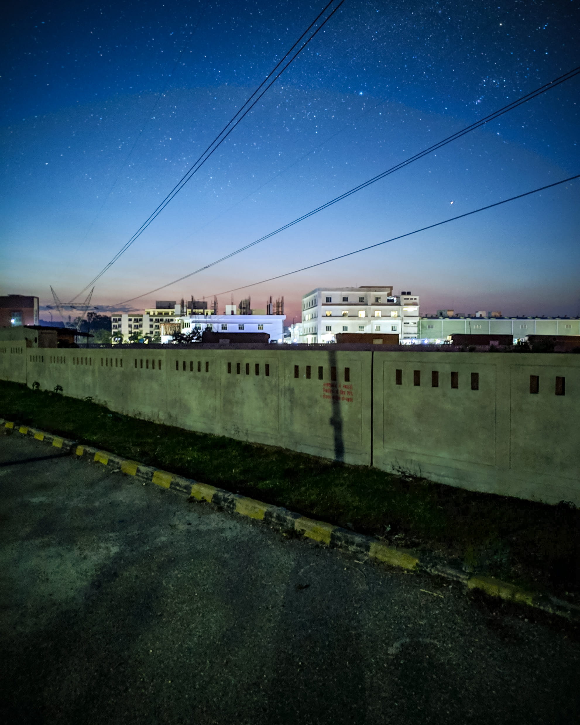 dusk, stars, light, city, wall, clear sky, high, 1080P, manufacturing, industrial, concrete, rise, no people, astronomy, outdoors, near, night, sidewalk, Phone HD Wallpaper