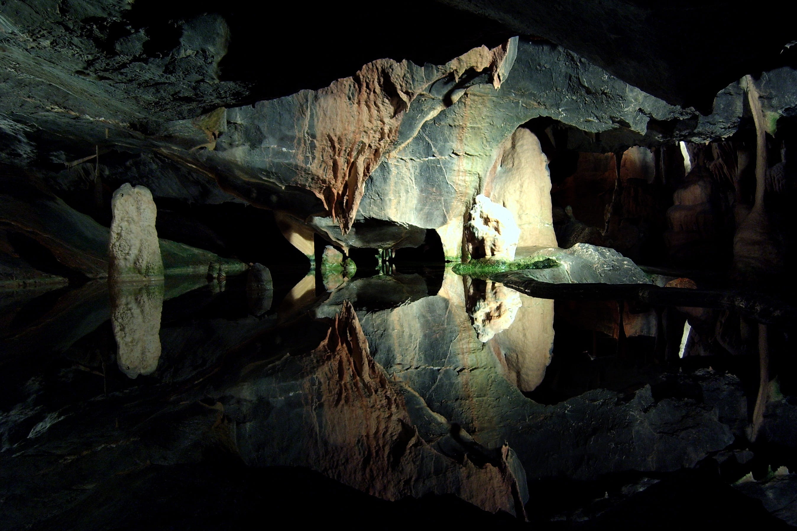 stalagmites, brown, nature, close-up, textured, rock formation, no people, natural, tree, solid, decor, 2K, rock, eroded, day, lighted, underground, green lighted, HD Wallpaper