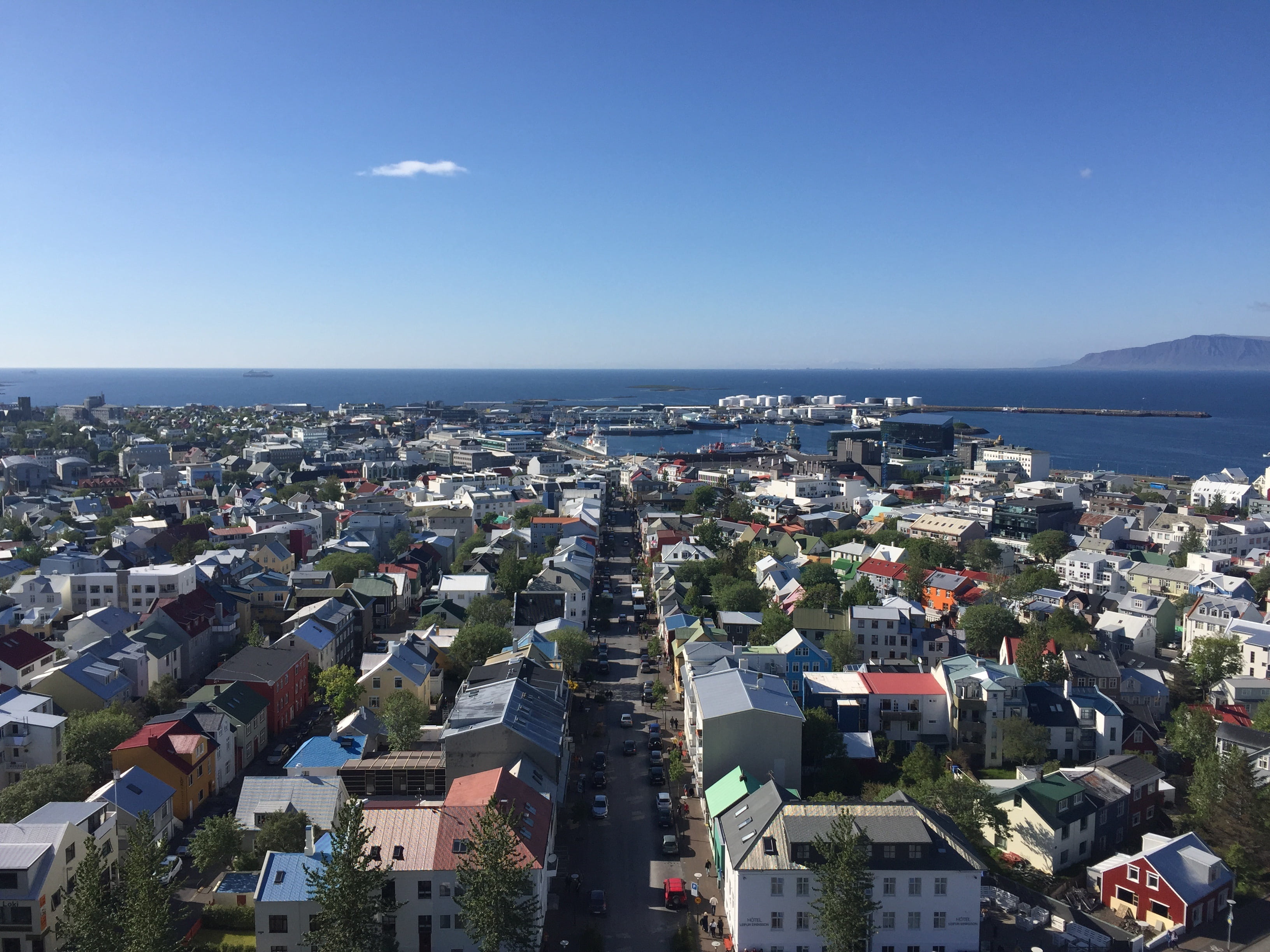 outdoors, town, iceland, 2K, horizon over water, blue, city, townscape, day, sea, architecture, horizon, nature, crowd, crowded, residential district, HD Wallpaper