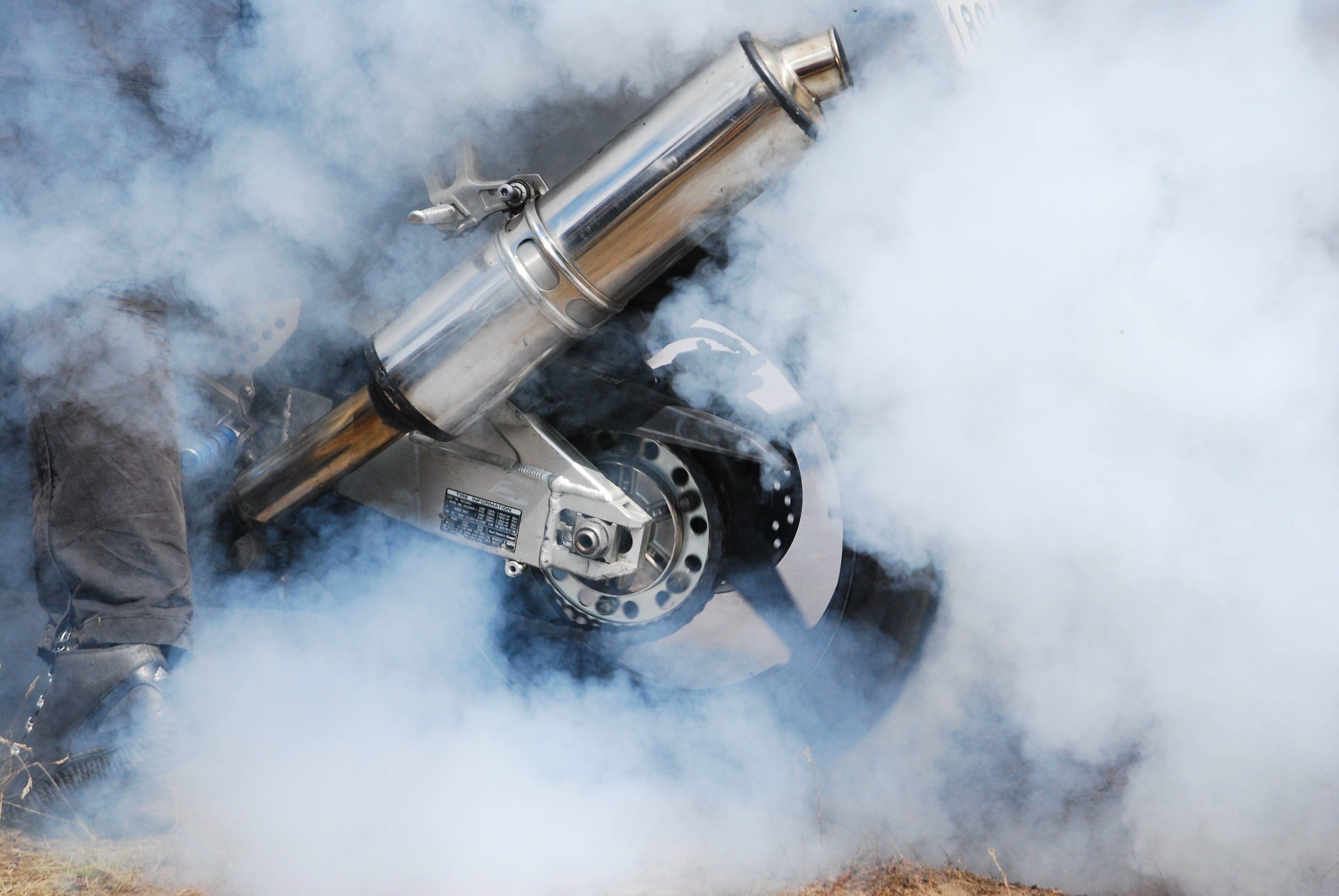 day, motor power, motorcycle, riding, weapon, nature, emitting, motion, engine, tech, exhaust, burnout, aerial view, burning rubber, outdoors, mode of transportation, HD Wallpaper