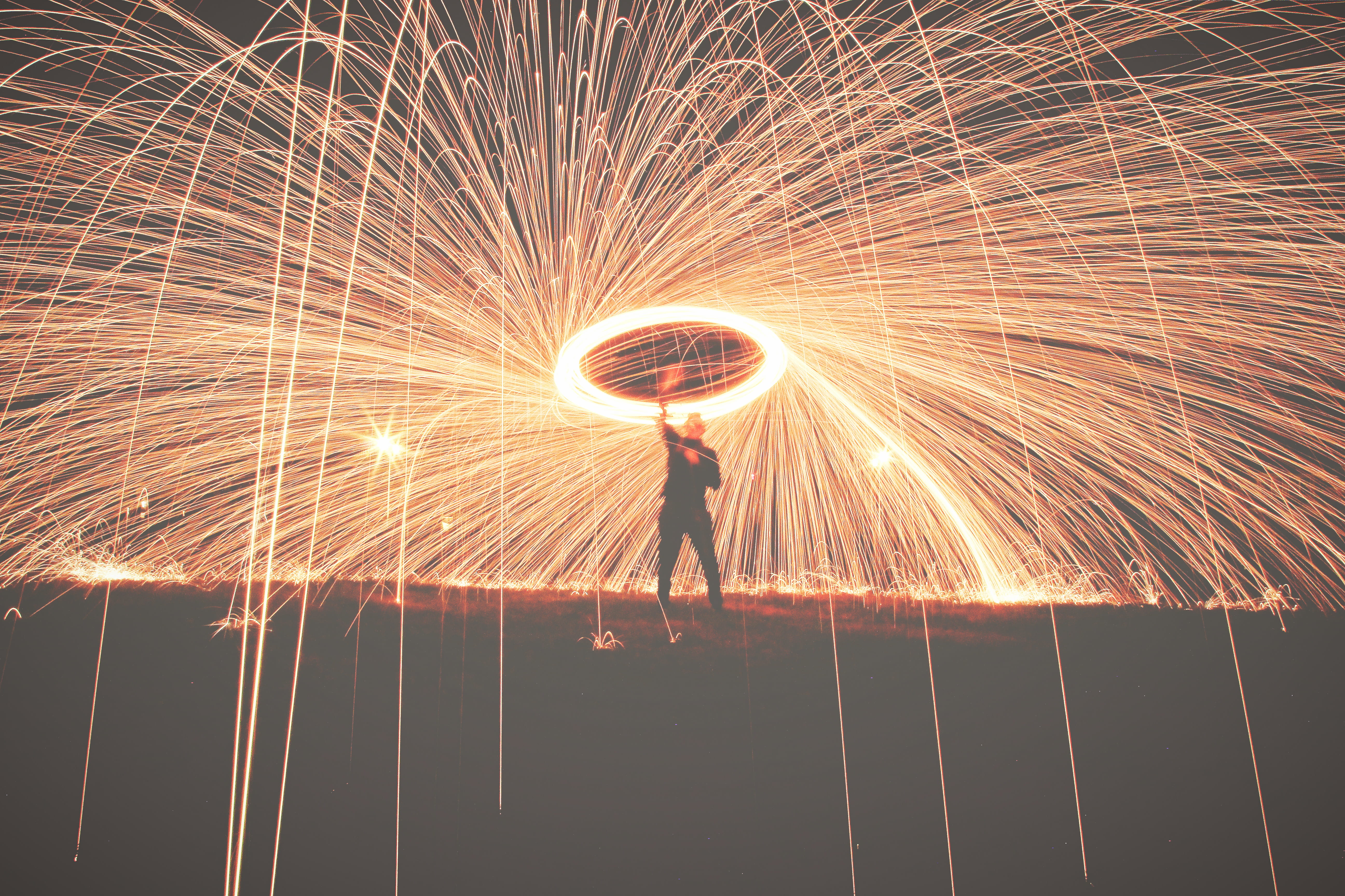 still, exploding, one person, man, real people, firework, bright, celebration, swirl, blurred motion, skill, wire wool, line, holding, glowing, long exposure, HD Wallpaper