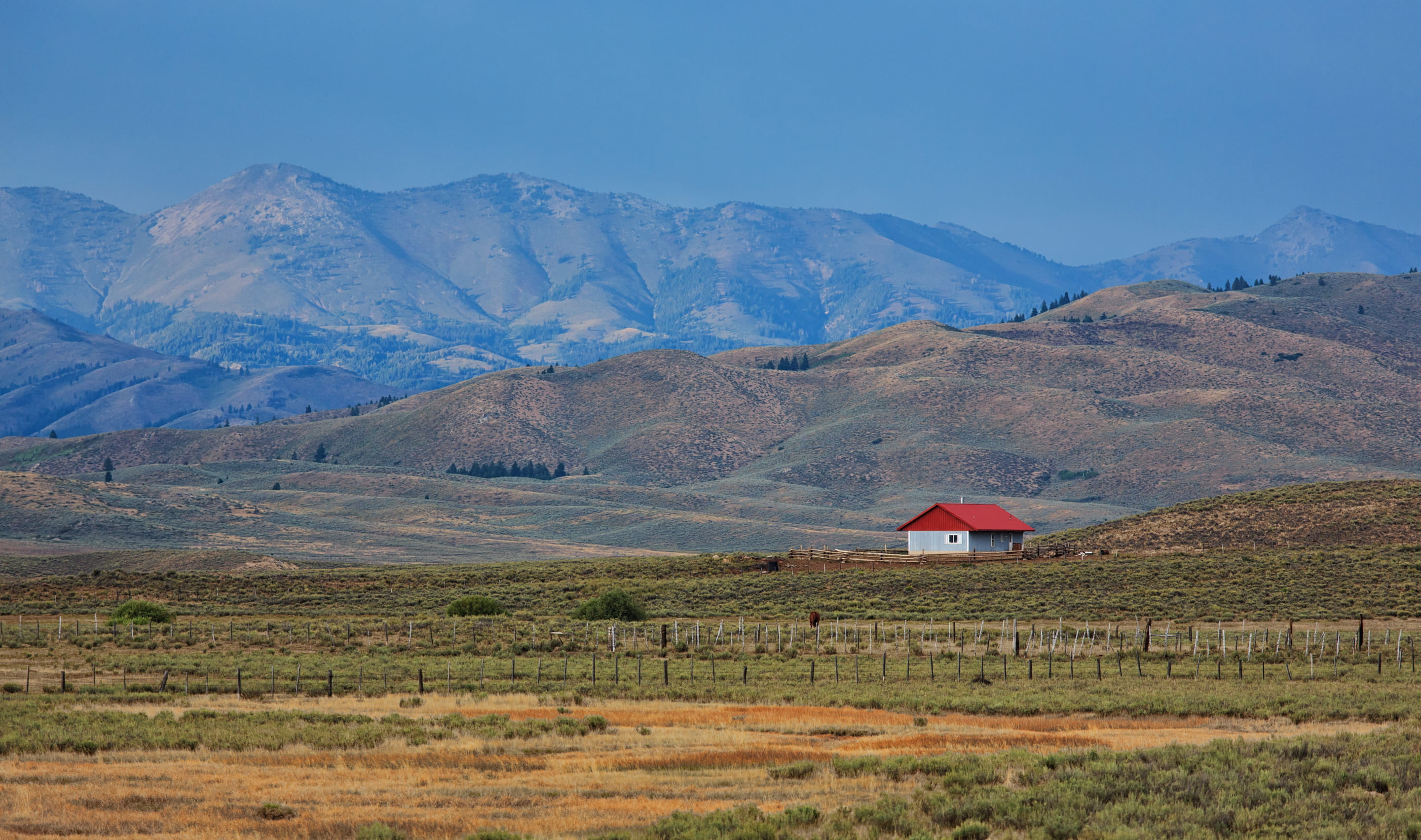 2K, mountain, grass, landscape, mountains, land, blue, environment, red, prairie, built structure, semi-arid, no people, sky, architecture, house, nature, HD Wallpaper