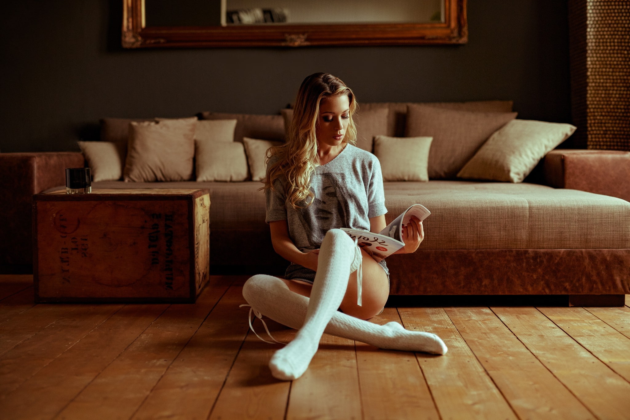 furniture, casual clothing, indoors, sitting on floor, full length, beautiful woman, one person, sitting, women model blonde long hair women indoors legs wavy hair stockings reading jean shorts socks, HD Wallpaper