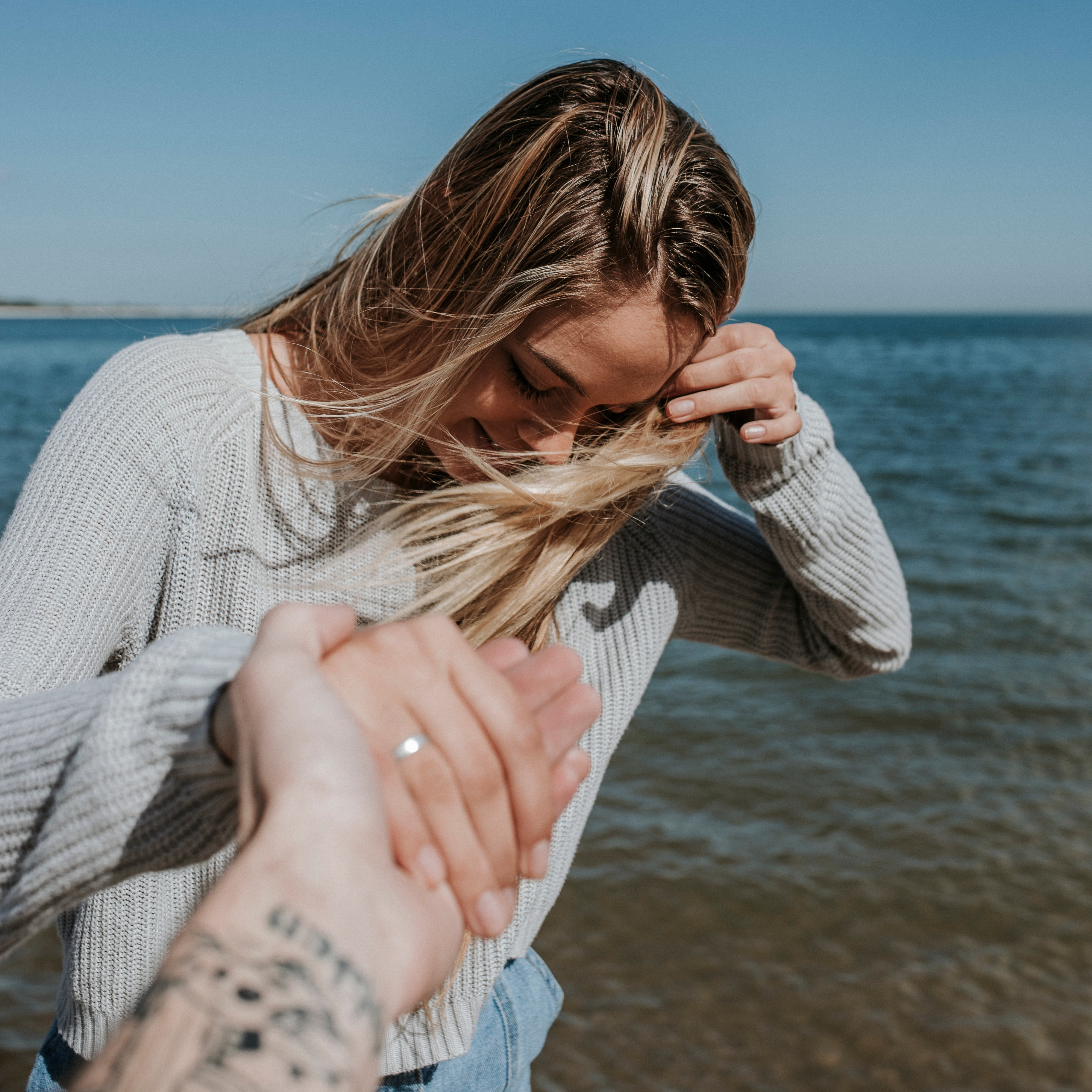 one person, travel, blond hair, hairstyle, young adult, woman, art, hands, vacation, holding, style, liquid, people, adventure, ring, sea, long hair, day, Phone HD Wallpaper