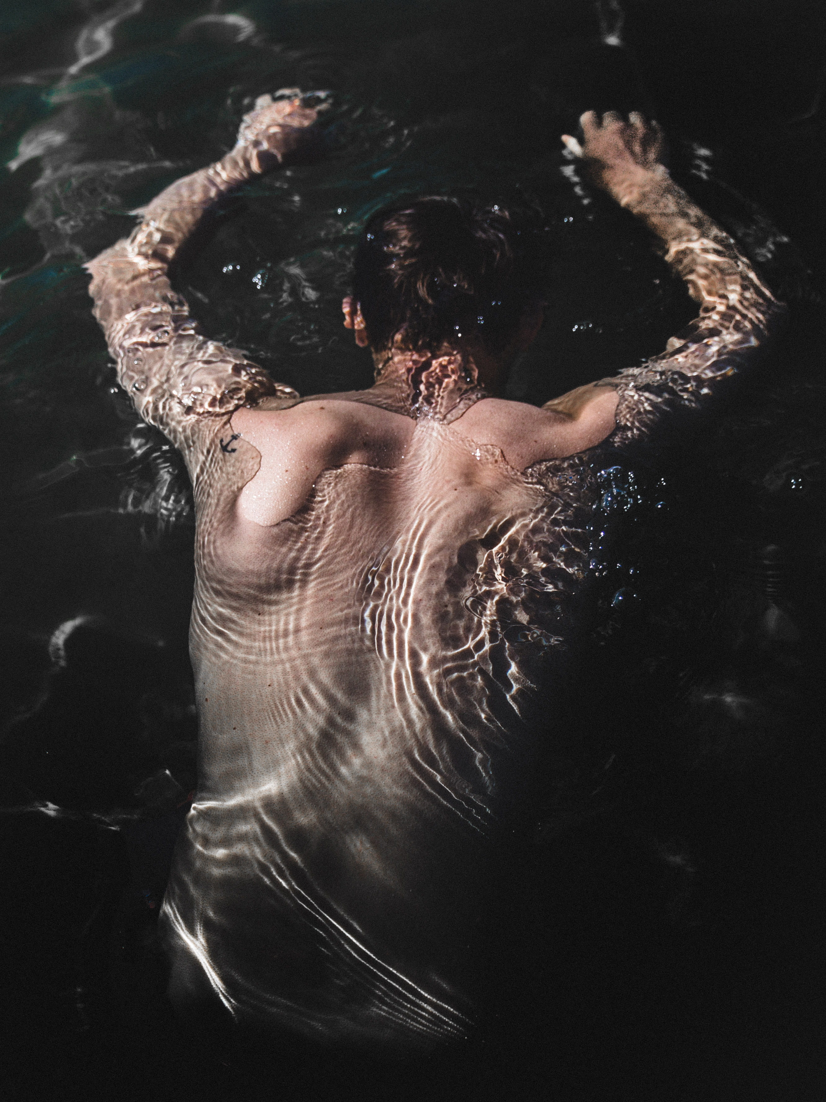 adult, wet, abstract, human arm, person, drown, real people, moody, three quarter length, indoors, arms raised, one person, young adult, shirtless, man, Phone HD Wallpaper