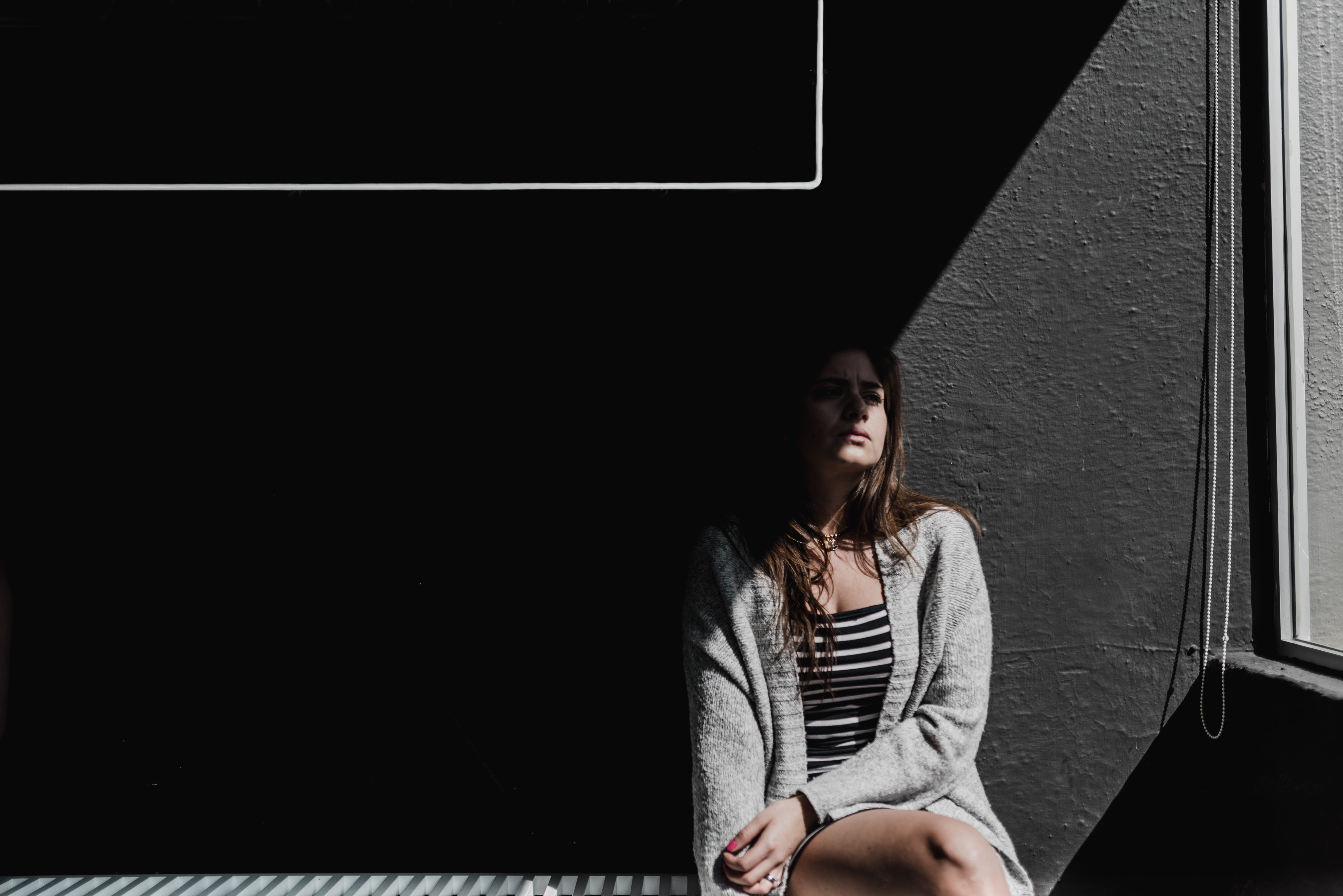 wall, contemplation, one person, dark, wall - building feature, lifestyles, near, real people, 5K, leisure activity, long hair, three quarter length, beautiful woman, HD Wallpaper