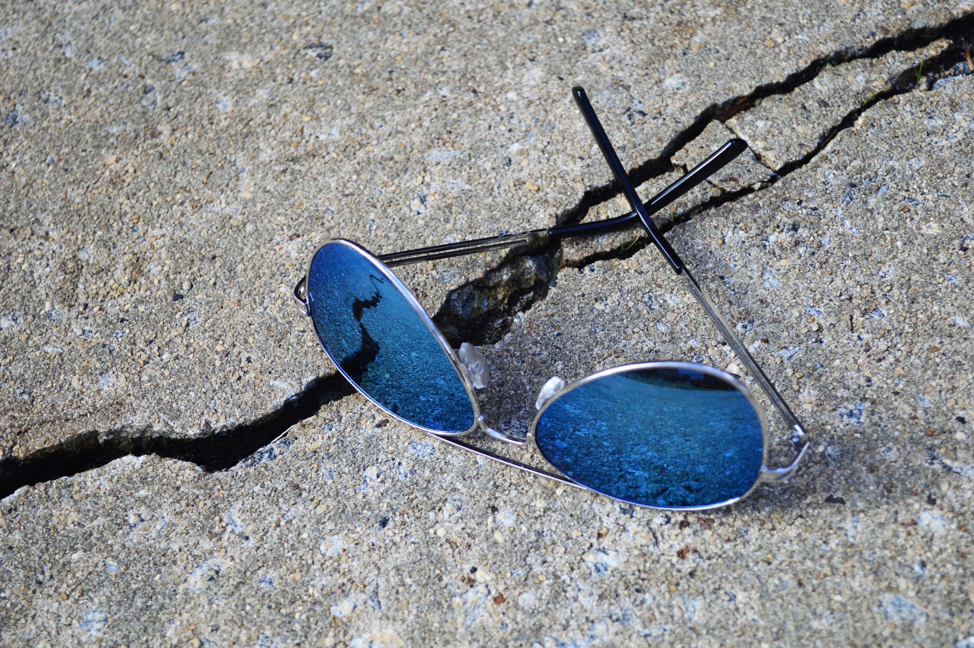 cracked, land, personal accessory, shadow, abandoned, aviator sunglasses, concrete, blue, high angle view, directly above, metal, close-up, still life, HD Wallpaper