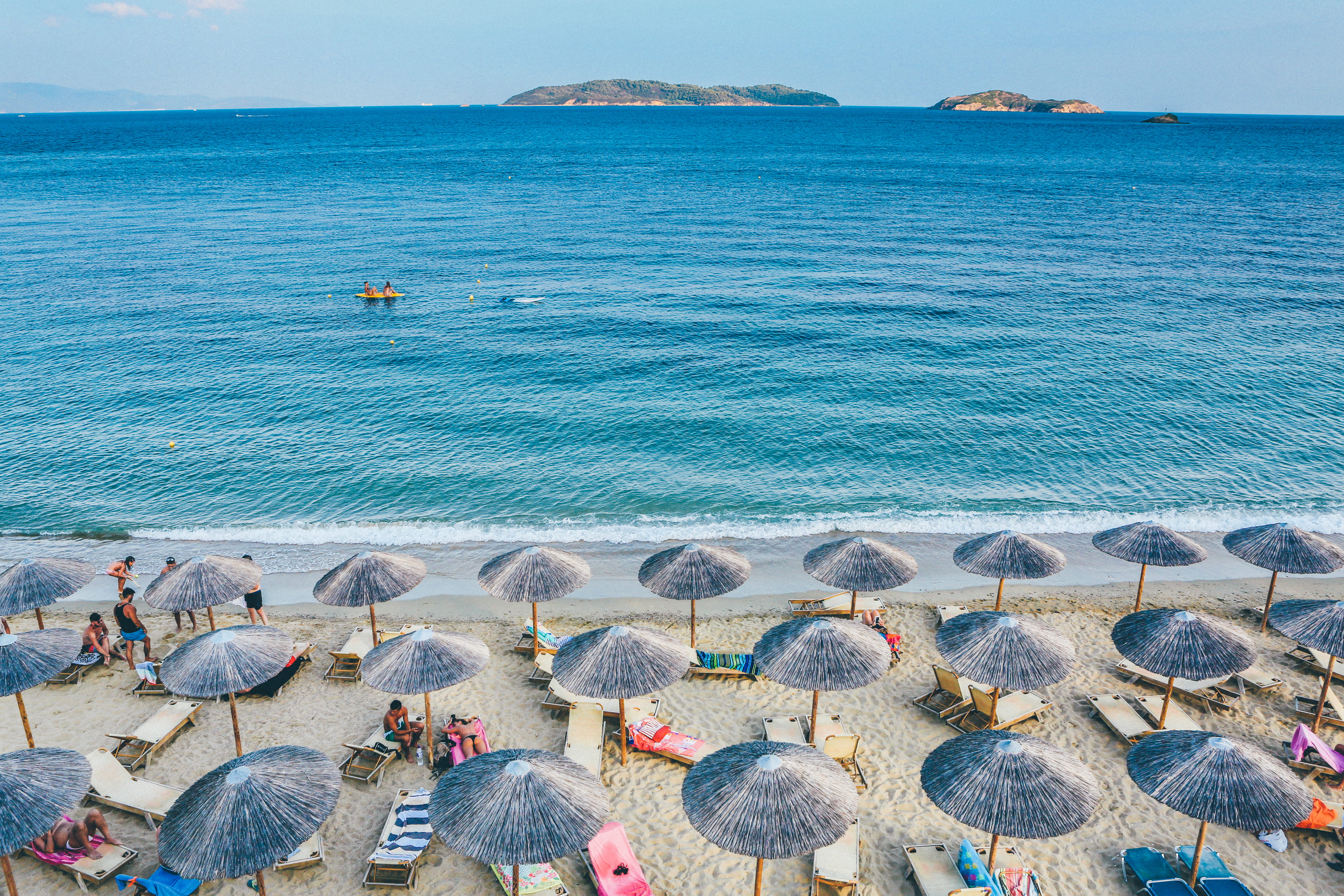 sea, tranquil scene, lounge, seashore, incidental people, parasols, island, umbrella, vacation, scenics - nature, water, tranquility, beauty in nature, HD Wallpaper
