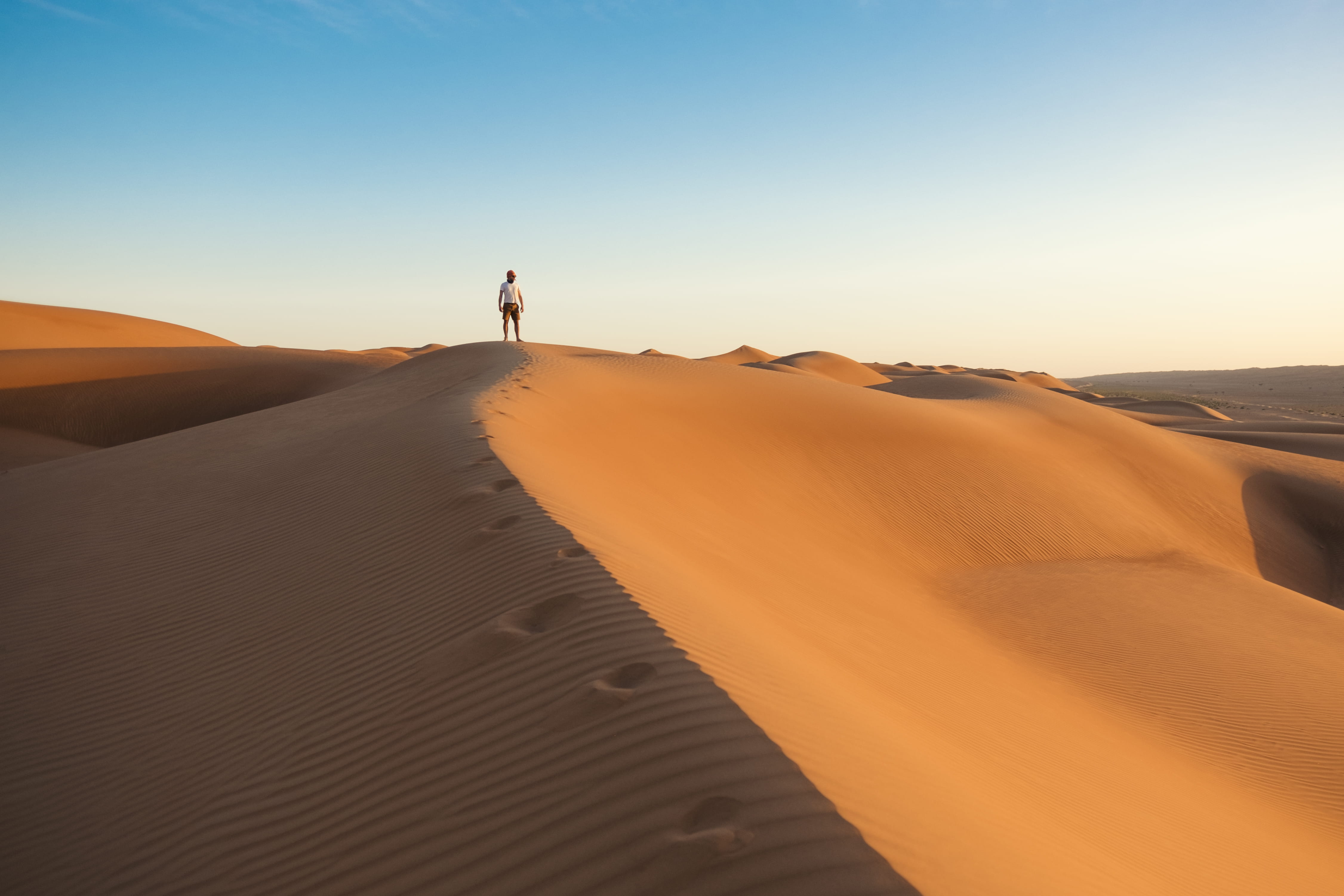 one person, clear sky, adventure, blue sky, arid climate, landscape, blue, scenics - nature, tranquil scene, climate, sky, 4K, beauty in nature, sand, HD Wallpaper