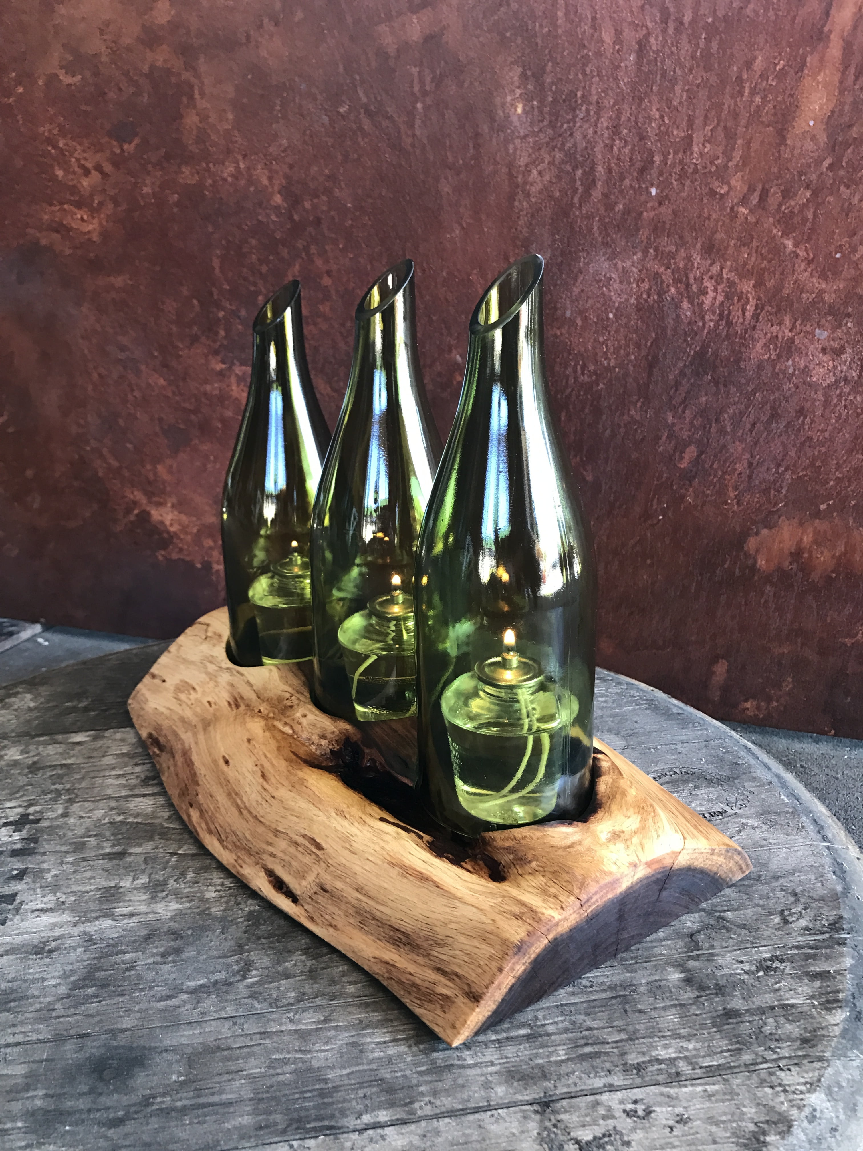 wine bottle, candle holder, glass - material, green color, high angle view, transparent, drink, container, close-up, glass, plank wood, oil, table, bottle, Phone HD Wallpaper