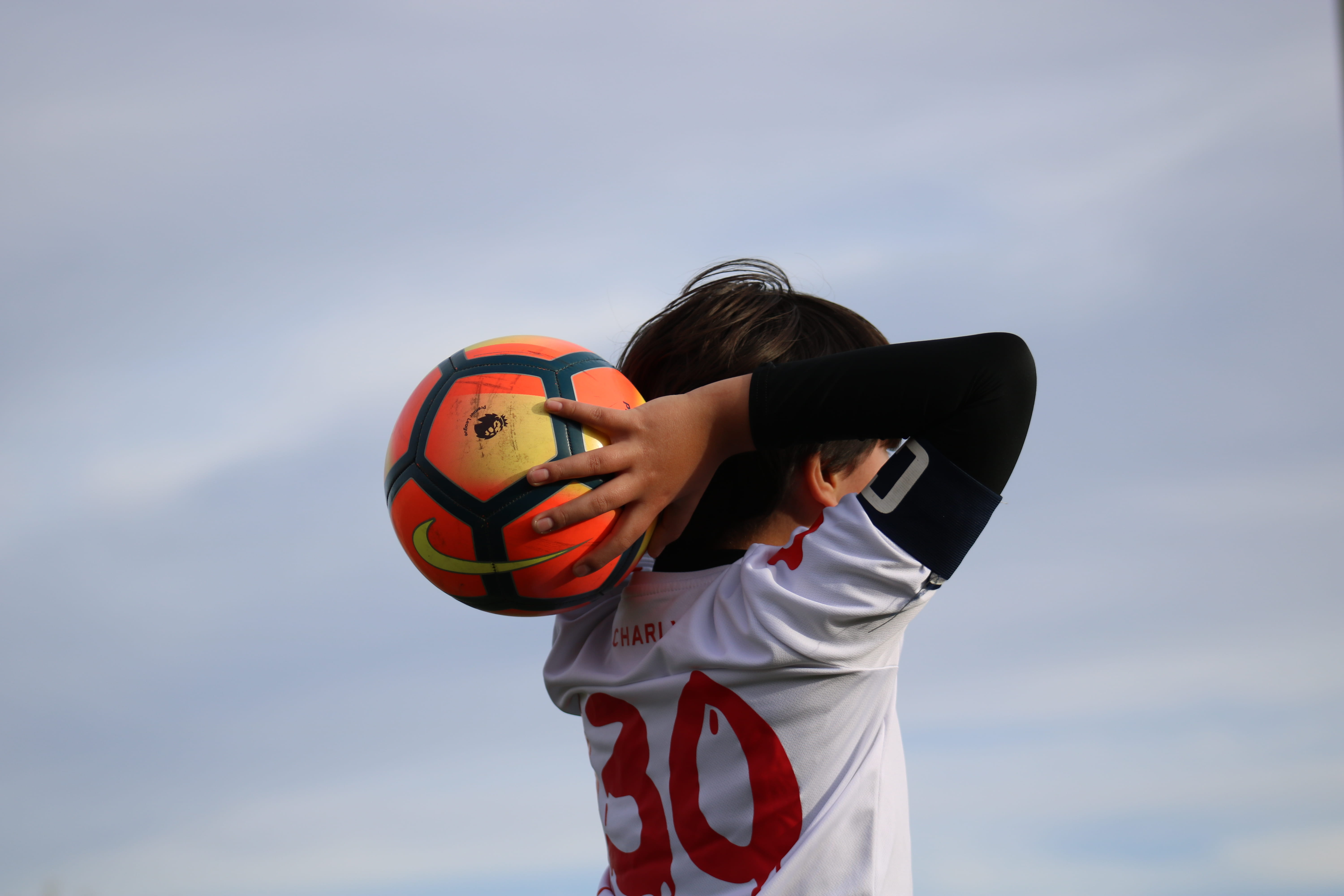 sports, female, team, soccer ball, lifestyles, holding, nature, ball, rear view, day, hairstyle, sphere, sport, united states, people, teenager, outdoors, HD Wallpaper