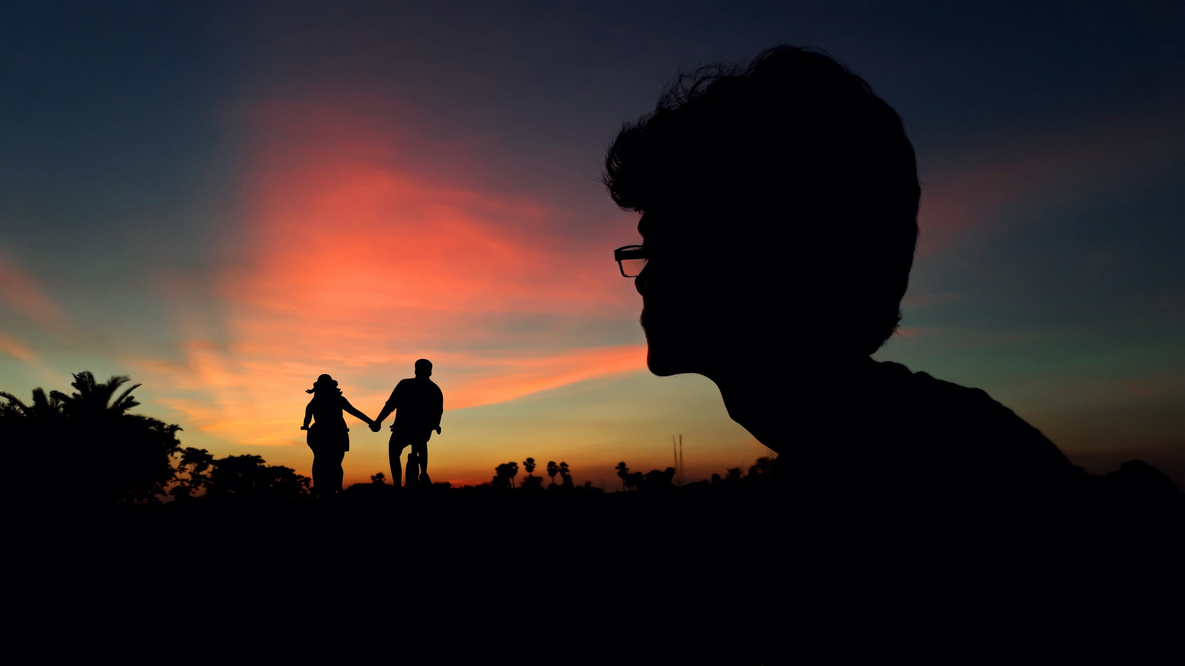 tranquil scene, looking, holding hand, cloud - sky, orange color, nature, outdoors, feeling, leisure activity, land, silhouette, real people, sunset, dusk, HD Wallpaper