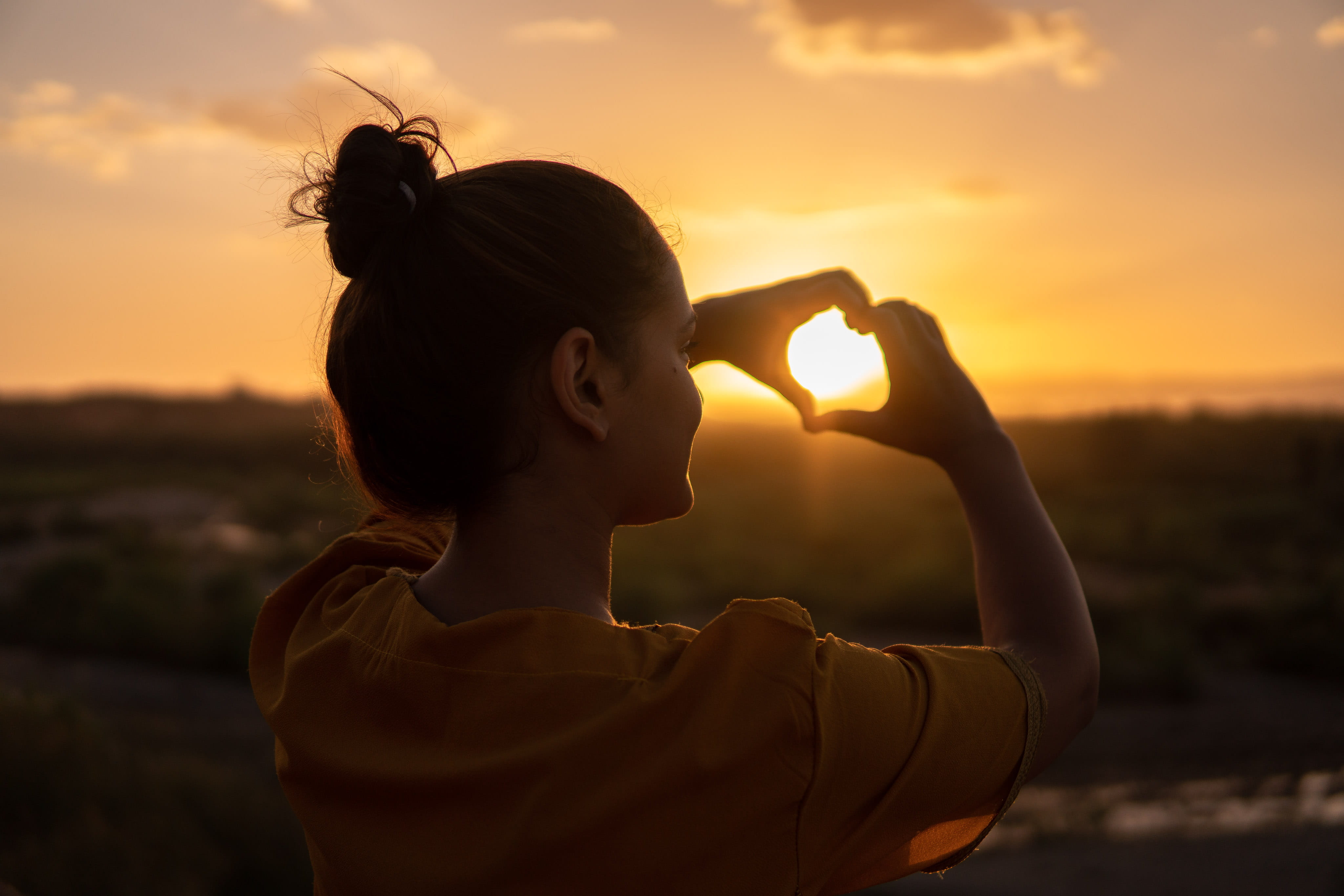 portrait, beach, sunset, hair, hairstyle, girl, young adult, morocco, nature, sky, 4K, heart shape, happiness, silhouette, side view, love, sun, profile view, HD Wallpaper