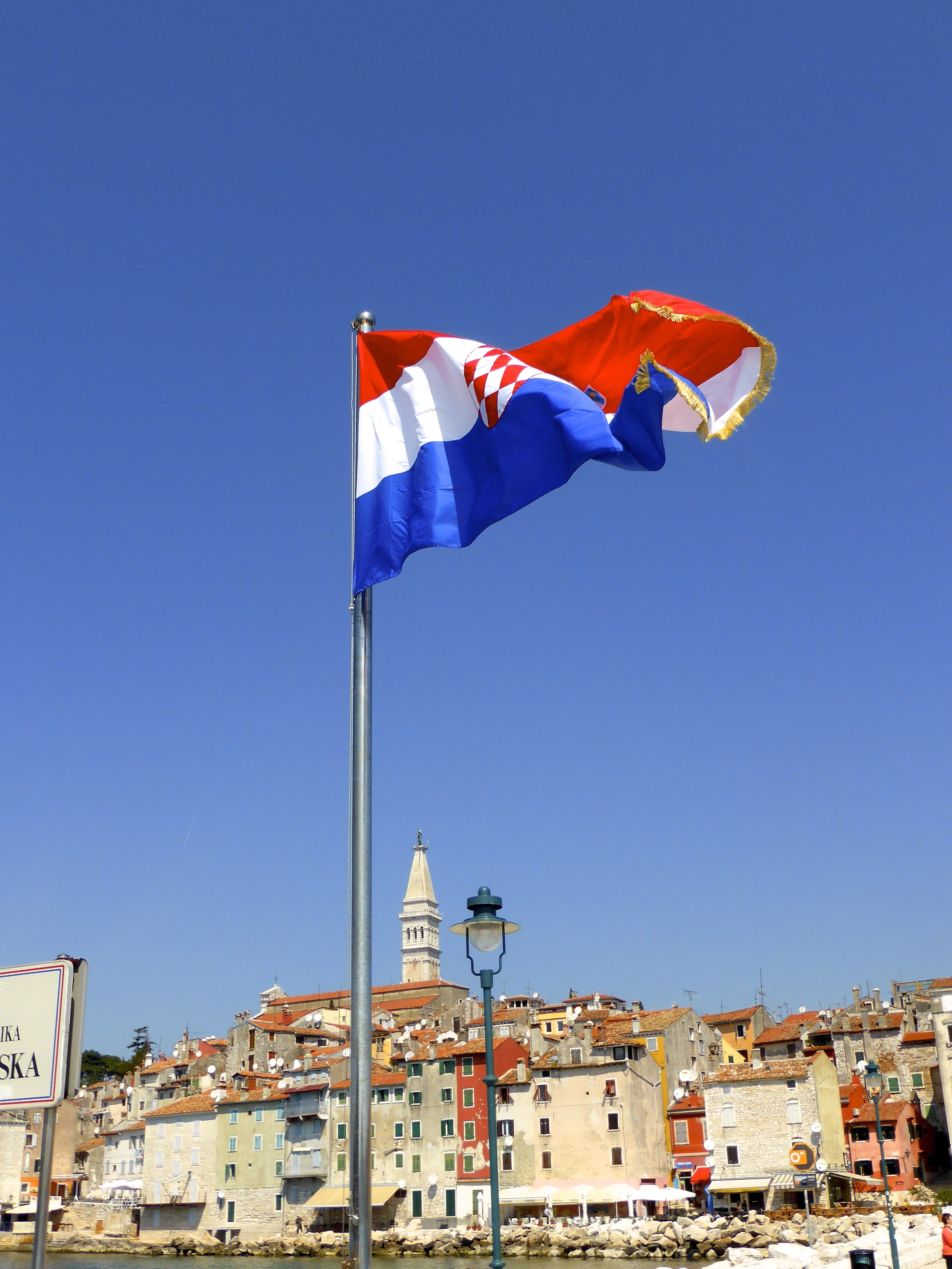 sky, 4K, city, low angle view, blue, solidarity, flag, independence, sunlight, country, outdoors, sign, nature, building exterior, clear sky, patriotism, Phone HD Wallpaper