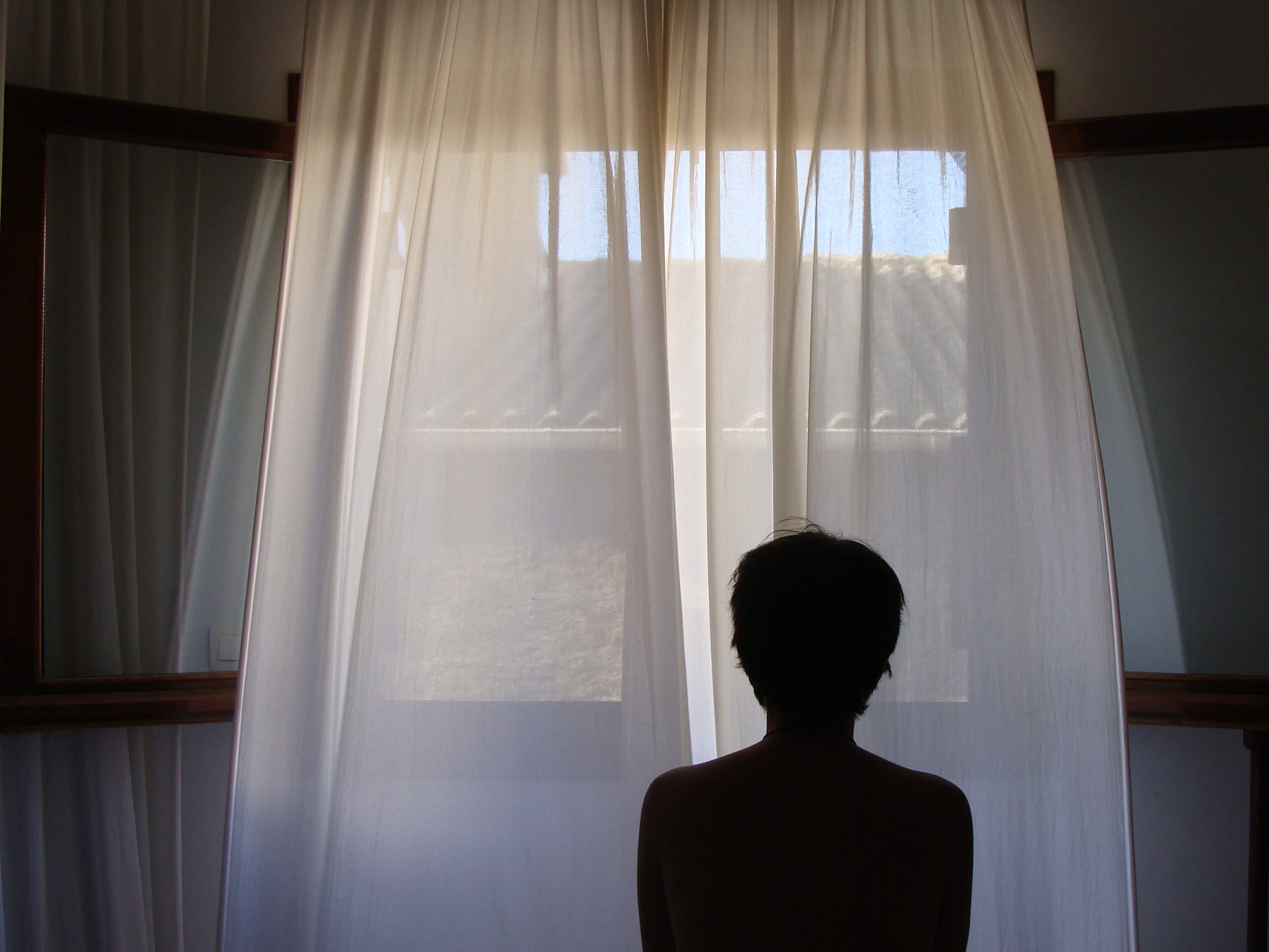 indoors, day, curtain, waiting, rear view, contemplation, soledad, backlight, adult, lifestyles, standing, home interior, people, window, 2K, looking, HD Wallpaper